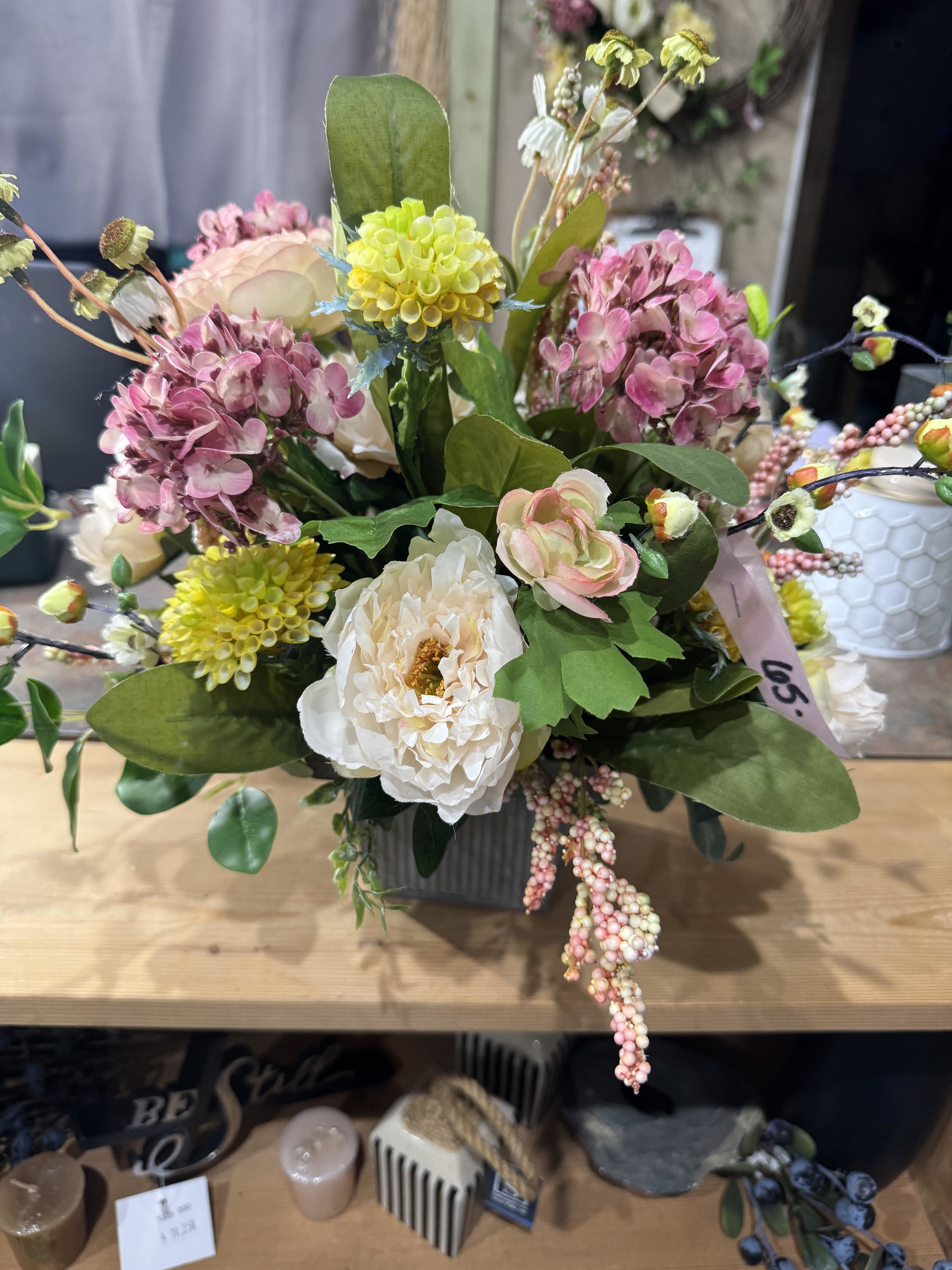 PEACHY MAUVE (PERMANENT ARRANGEMENT) - A silk (permanent) arrangement with faux mauve, yellow, and peachy blooms