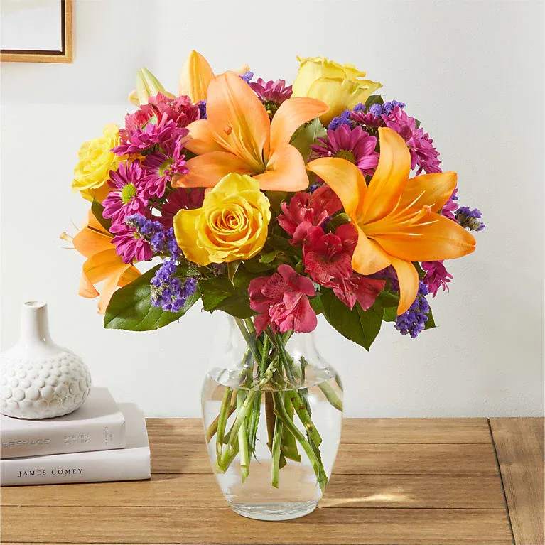 Eckert Florist's FTD Colorful Visions Bouquet - A vibrant and bold mix of beautiful florals, perfect for adding a pop of color to any room or occasion. Whether you are celebrating a milestone, expressing your appreciation, or simply providing a smile, the Colorful Visions Bouquet will do the trick. Flower varieties and colors may vary.
