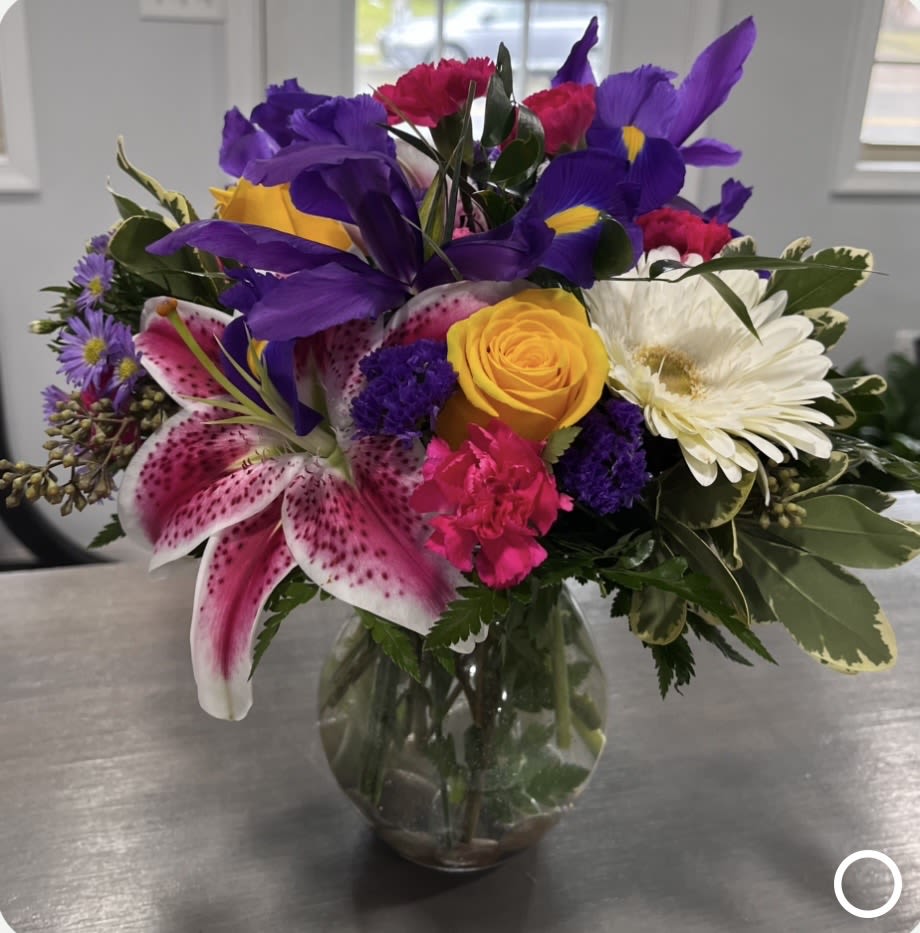 Summer Time - Every wonderful accomplishment deserves this wonderous acknowledgement, featuring an elegant calla lily kissed by roses, alstroemeria, carnations and trachelium.