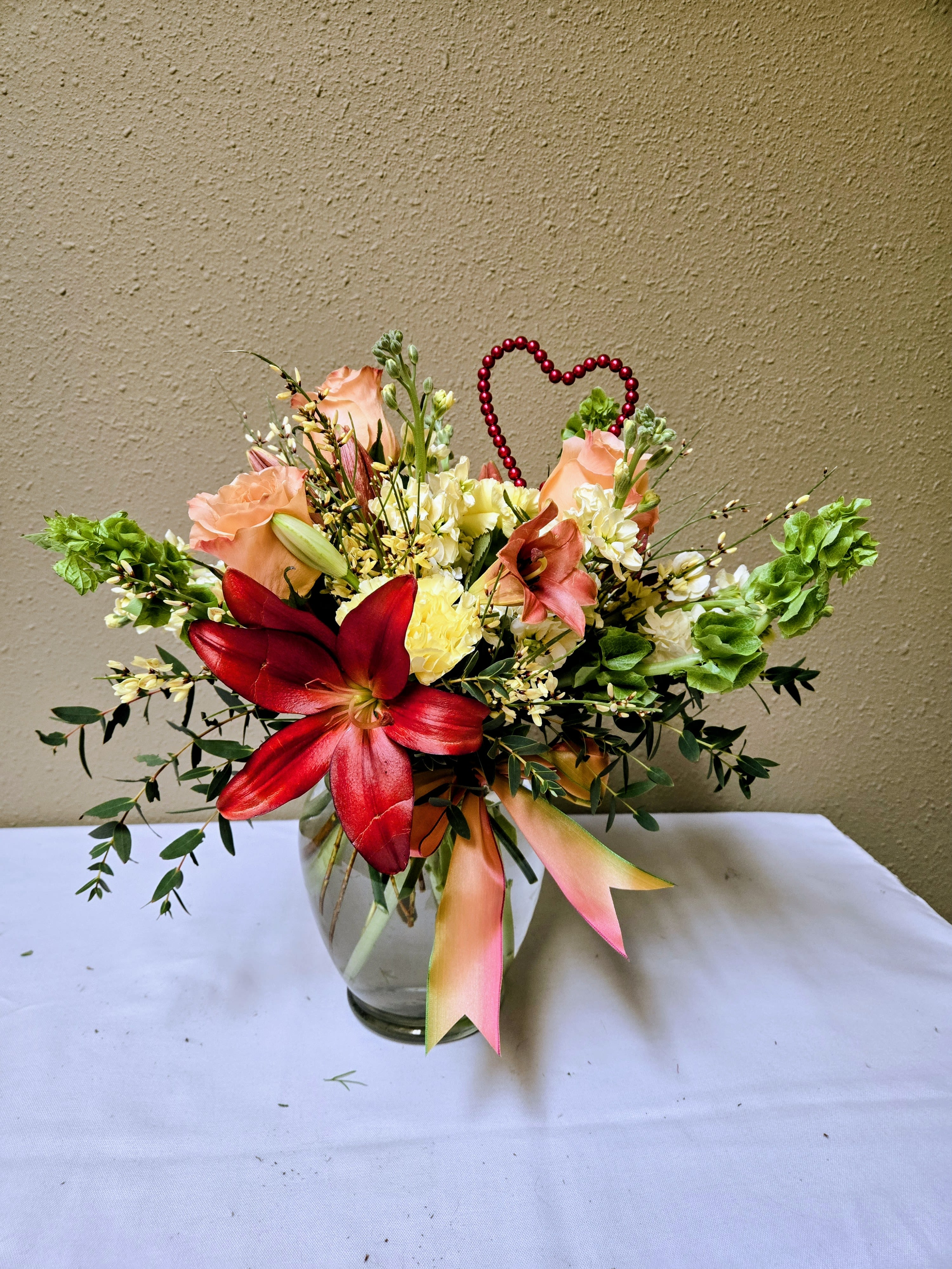 Agnes - Colors and flowers may vary based upon availability.