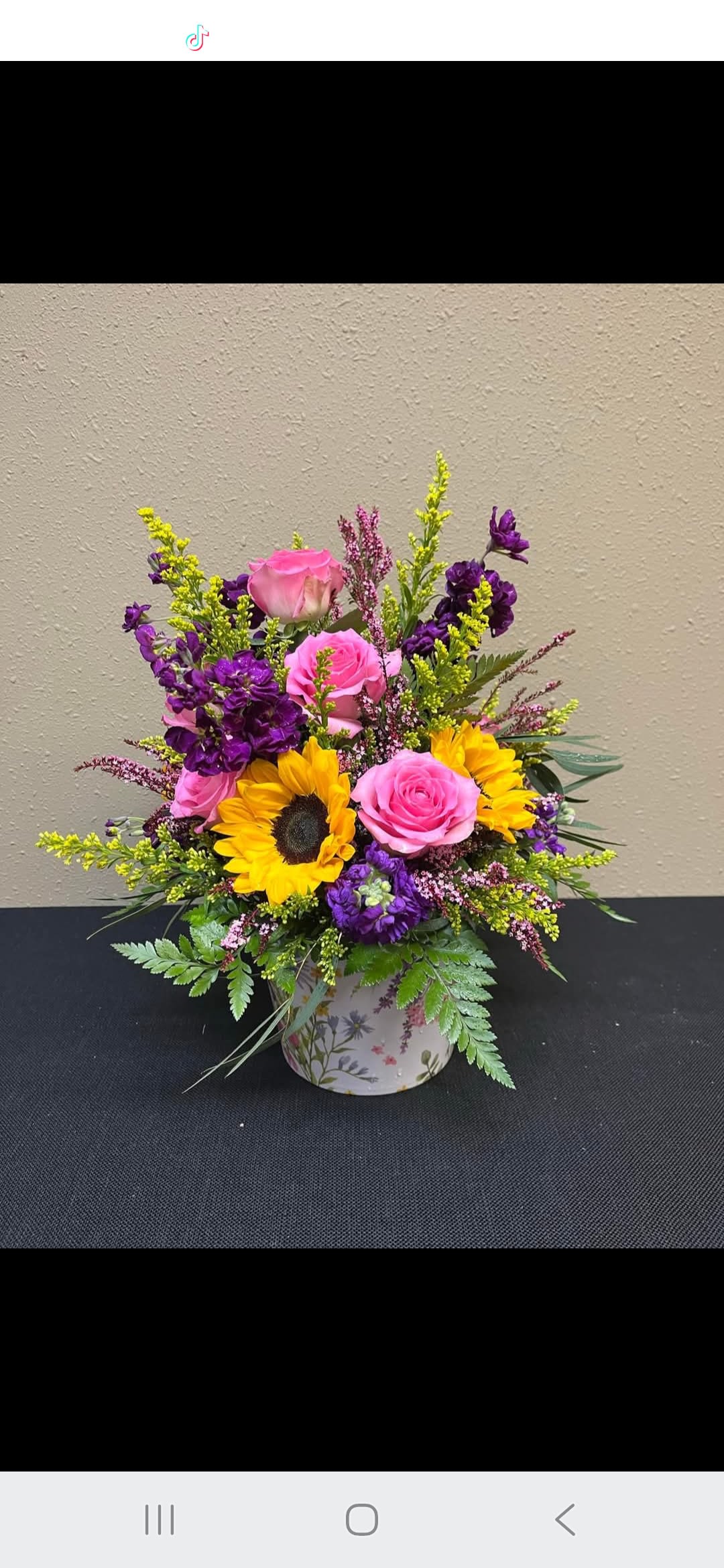 Lucille - Colors and flowers may vary based upon availability.