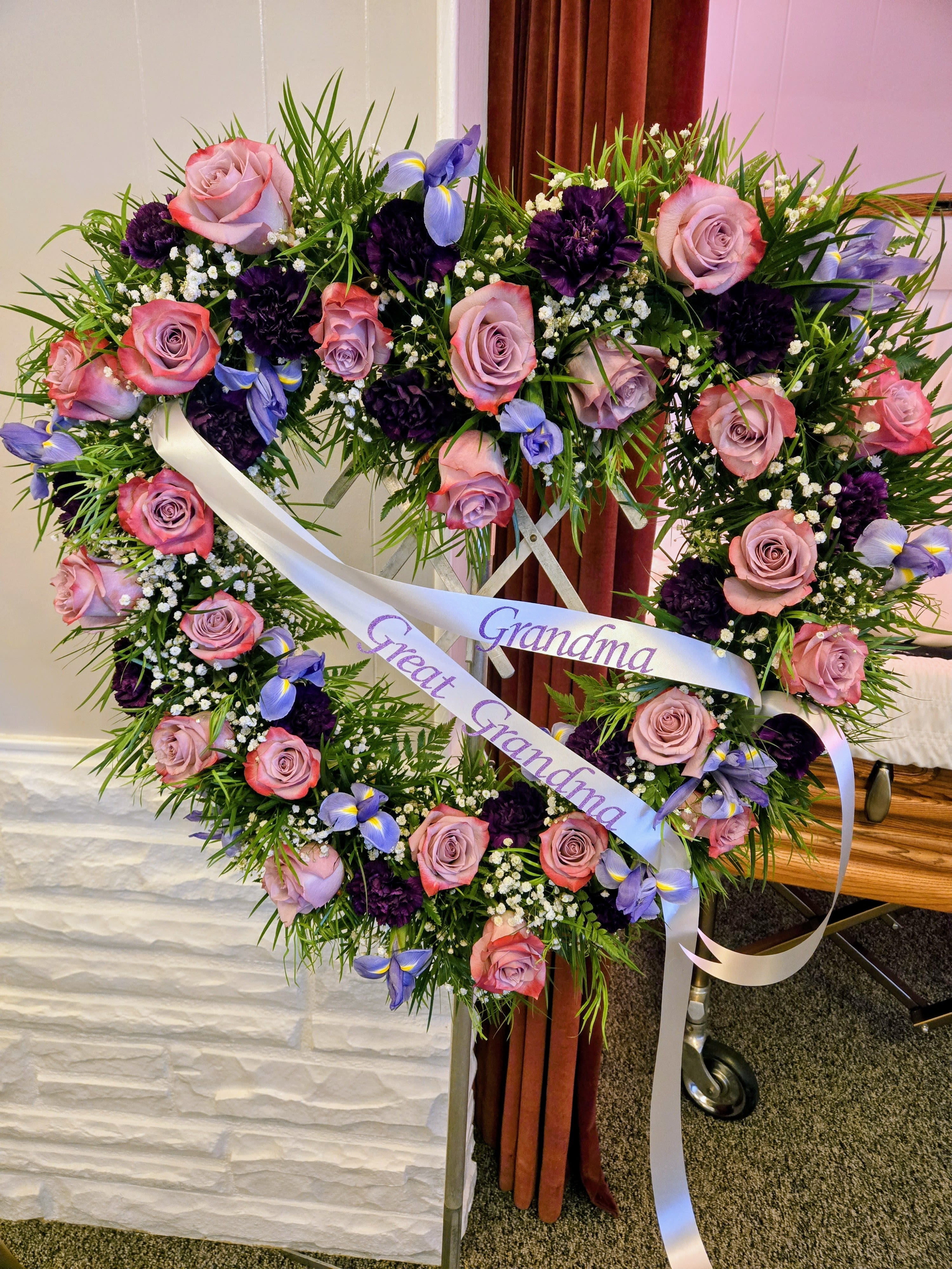 Open Heart Wreath - Colors and flowers may vary based upon availability.