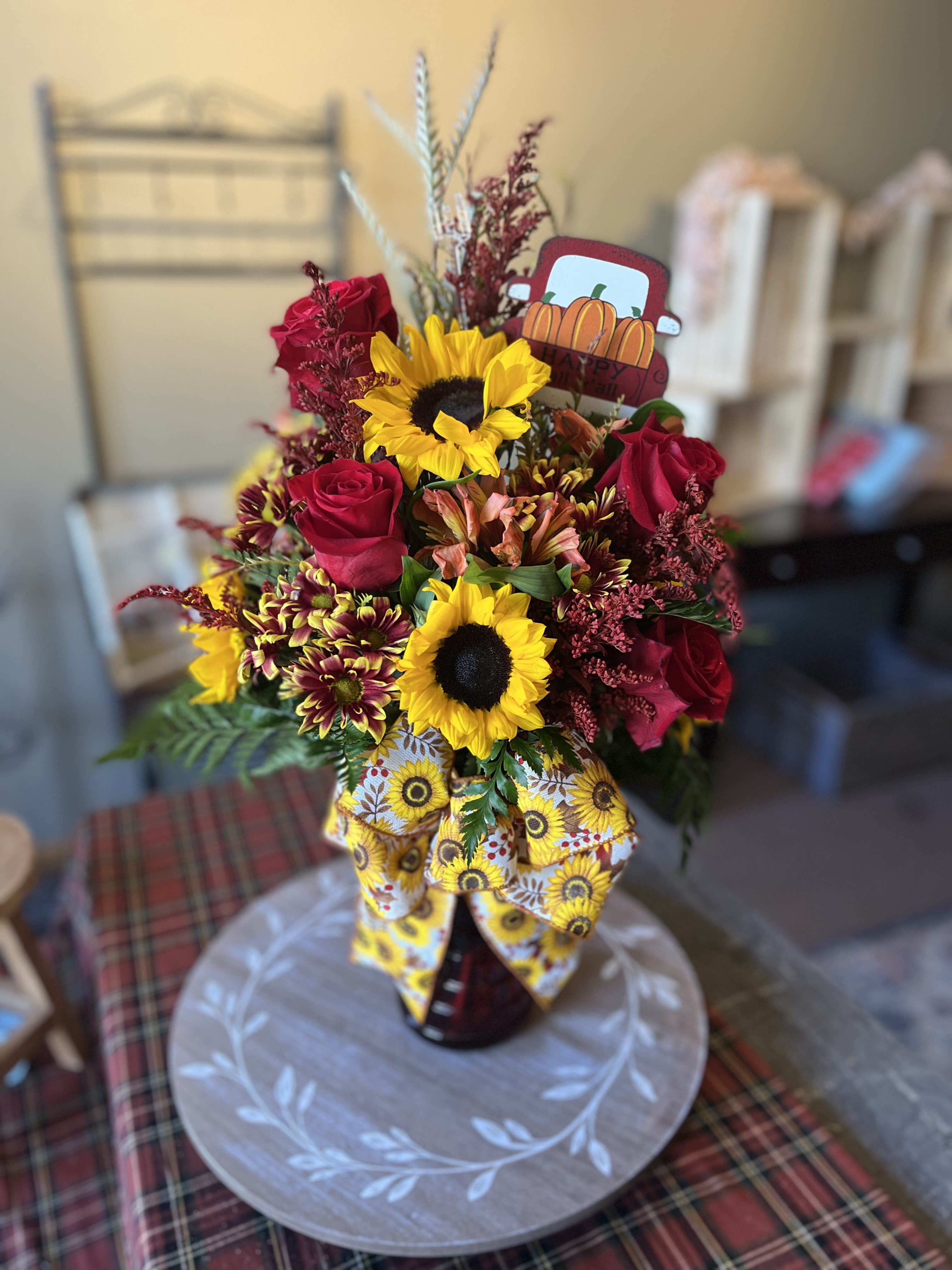 Penelope - Colors and flowers may vary based upon availability.