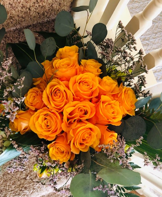 A Dozen Roses - Let the special people in your life know how much you care for them with this beautiful bouquet of roses. It surely is an all time favorite and a wonderful gift for your loved ones. This bouquet contains 12 premium roses (single color) and fresh seasonal greens, does not come in a vase. If you have a particular color in mind , let us know and we will do our best to accommodate your request. For same day delivery and FREE DELIVERY options Call 832-973-1376.  