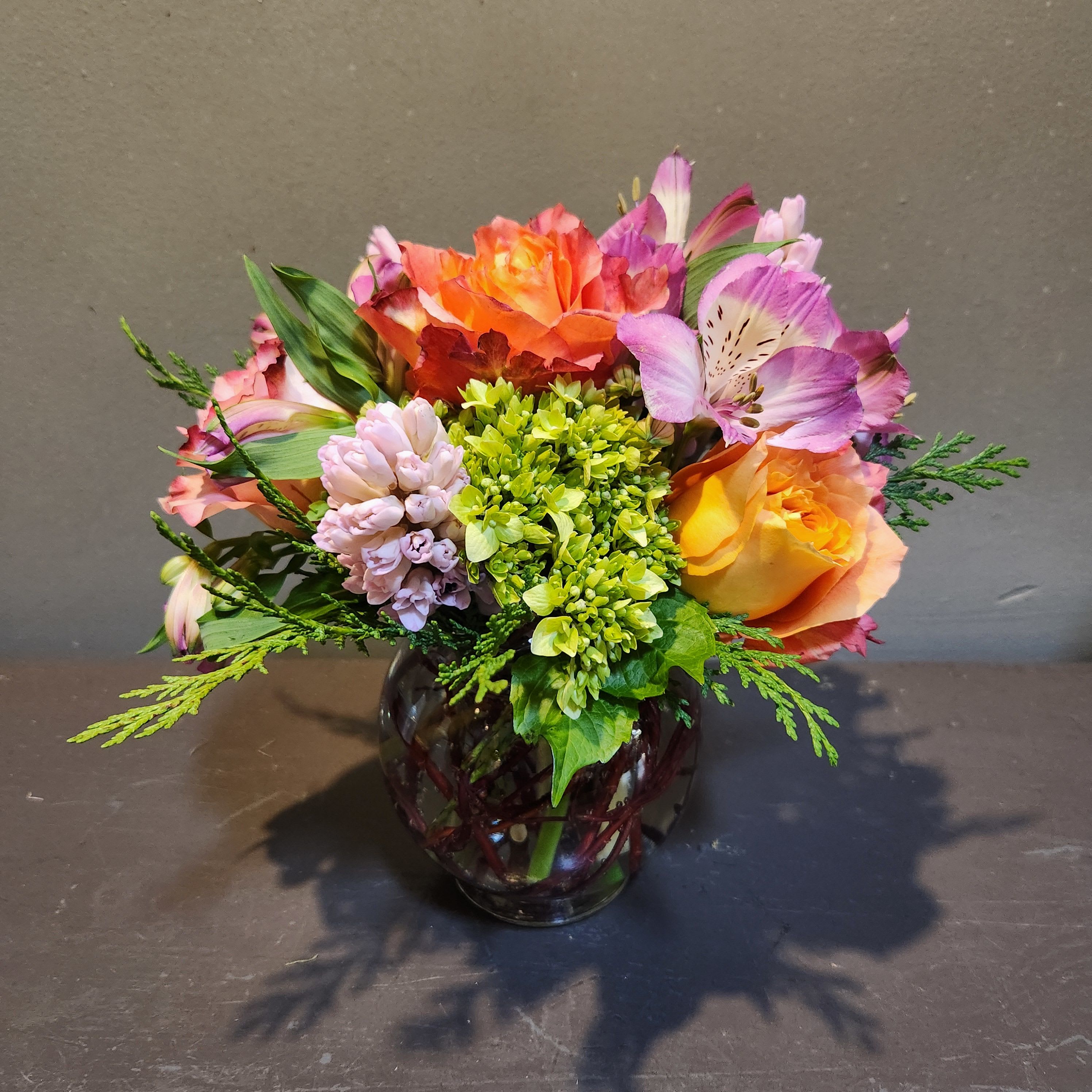 Punch of Color - Lush colorful tones in a cube vase - perfect for a coffee table or side table.  Measures approx. 10"Tx10"W.