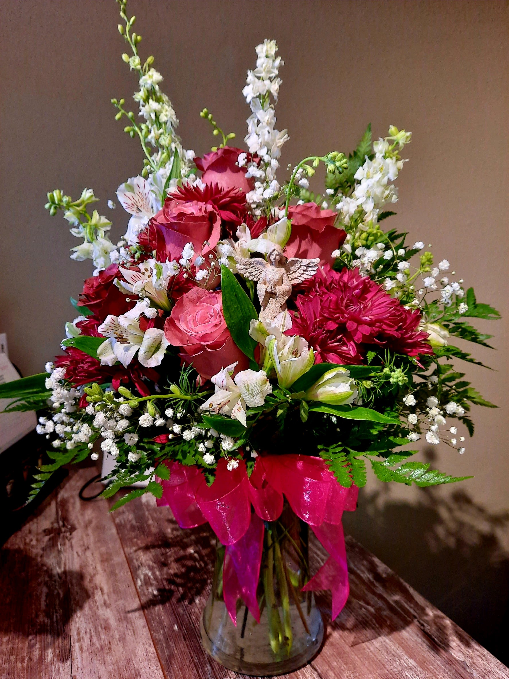 Florence - Colors and flowers may vary based upon availability.