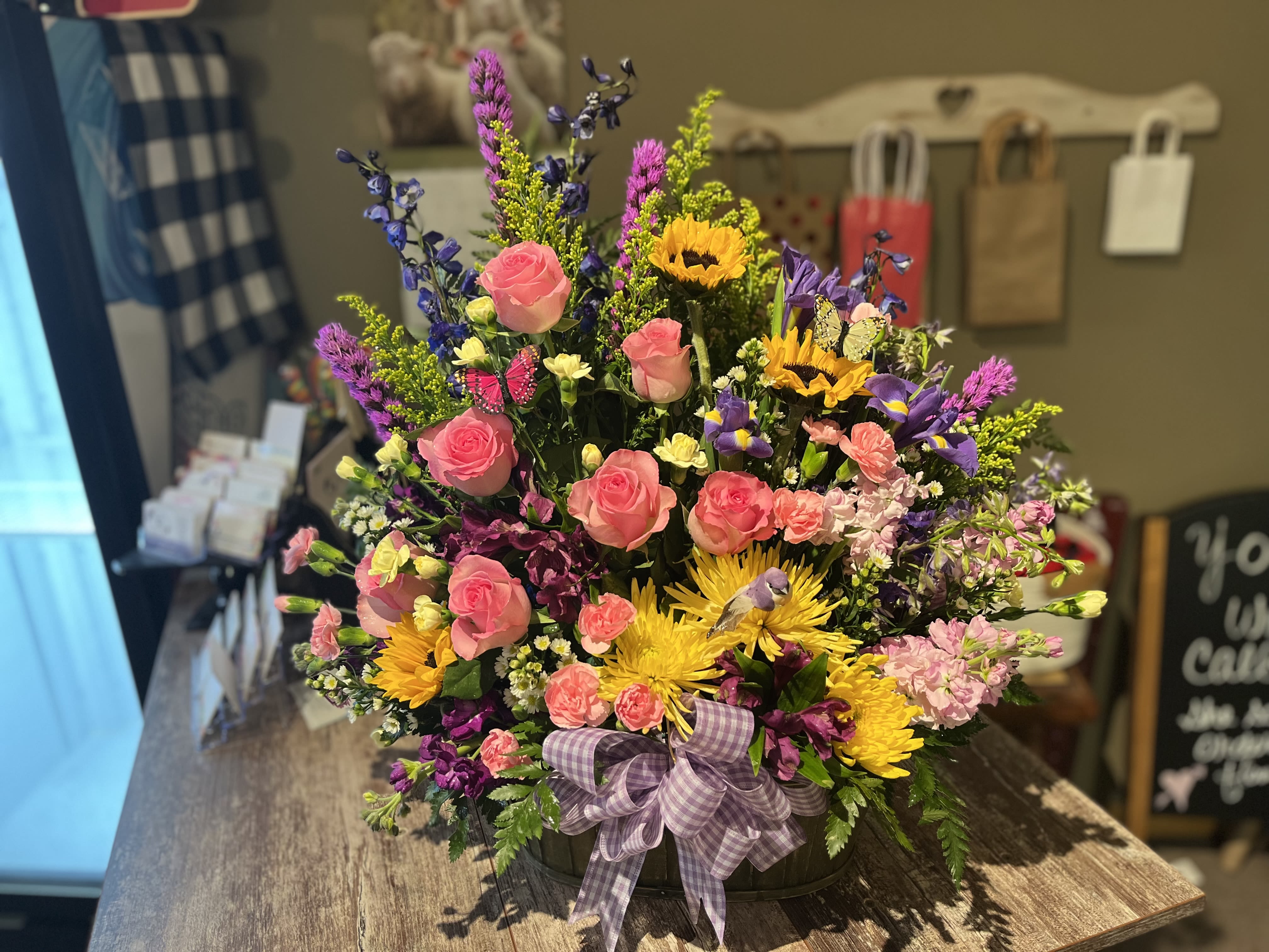 Pippa - Colors and flowers may vary based upon availability.