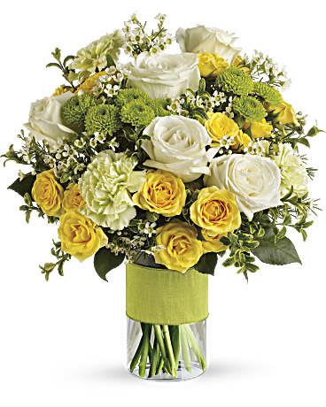 Teleflora Your Sweet Smile - You can't help but smile, this bouquet is like sunshine in a vase!   A mix of yellow and white roses, green carnations and button pompons in a tall cylinder vase.  