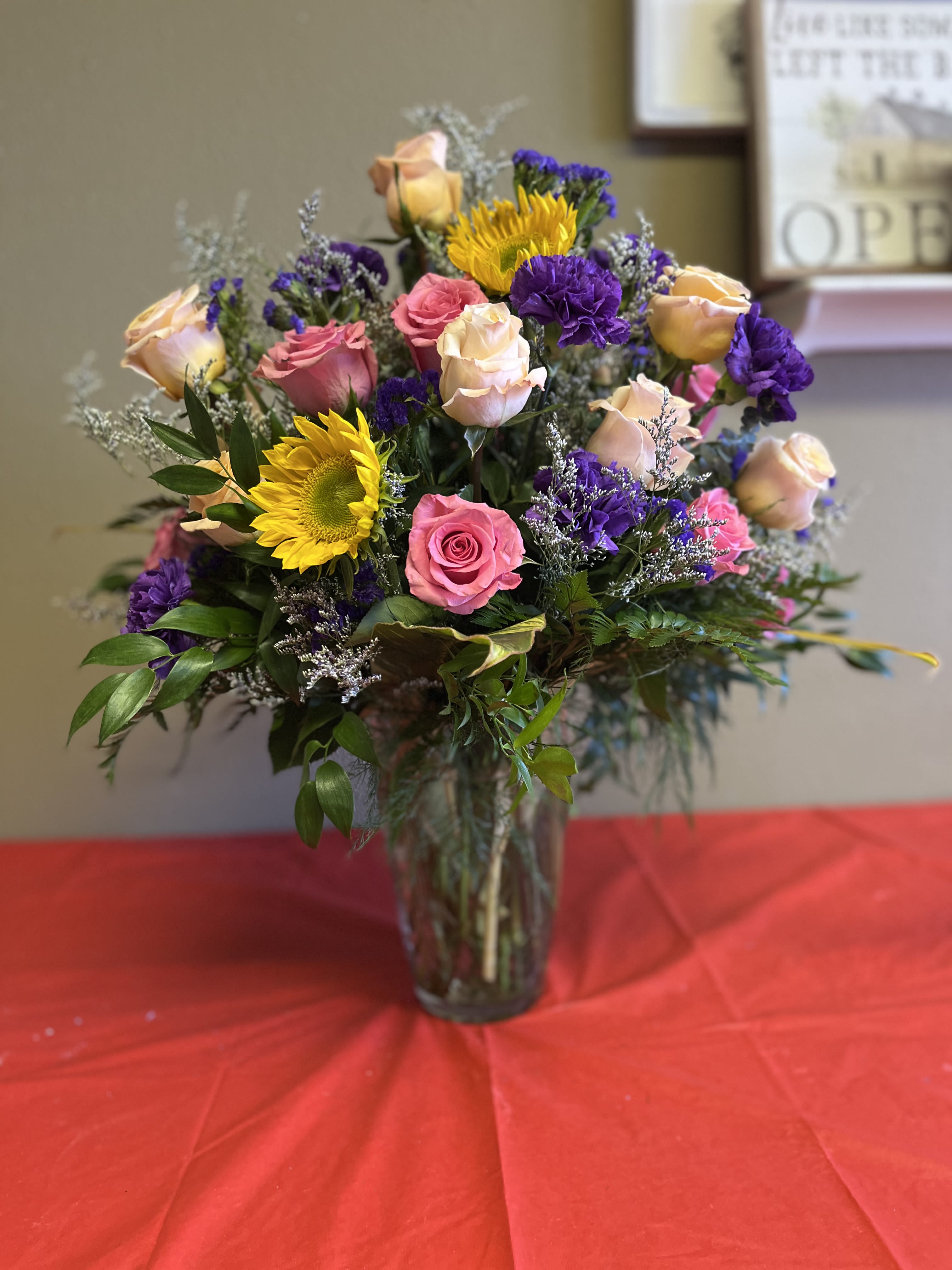 18 Rose mix arrangement - Colors and flowers may vary based upon availability.
