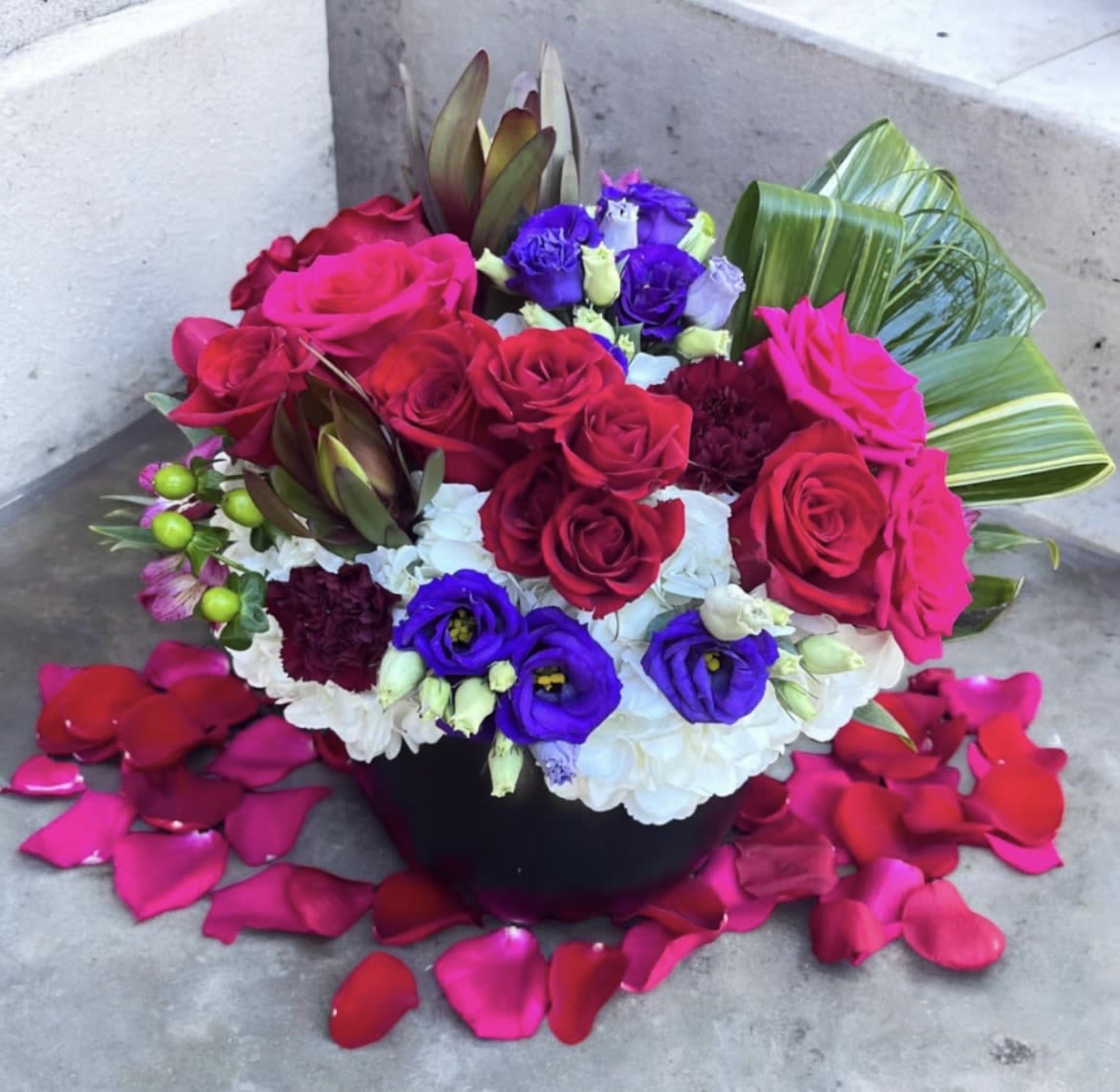 Forever and Always - This beautifully designed arrangement is filled with hydrangea, roses, spray roses, Lisianthus, safari sunset, aspidistra, Beargrass, alstroemeria, carnations, hypericum and lemon leaf. 