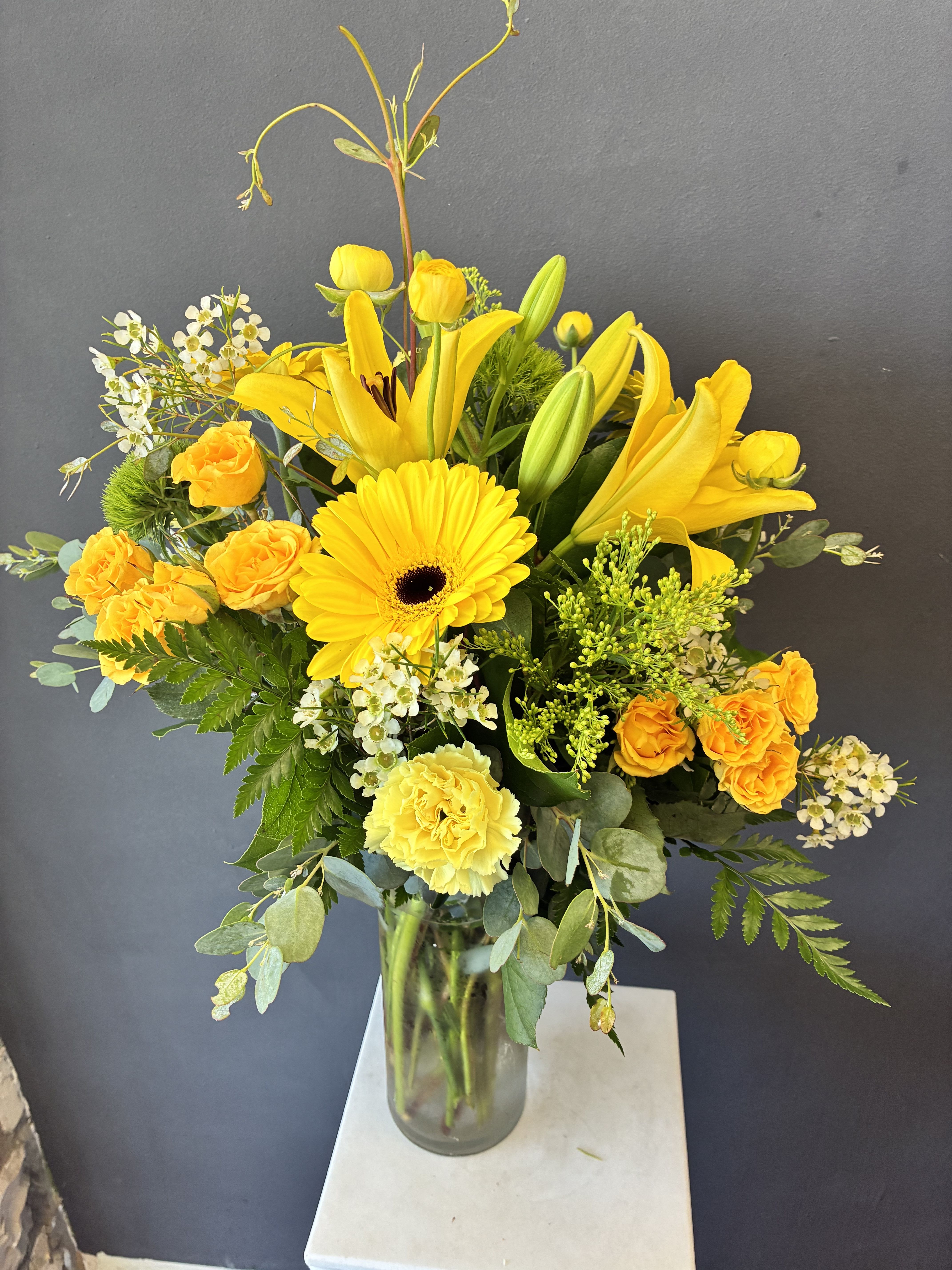 #17 Designers Choice  - Brighten someone's day with a beautiful all yellow arrangement 