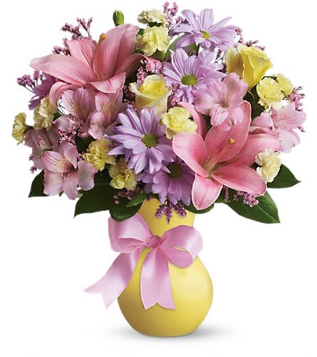 Teleflora's Simply Sweet - Sometimes life's simplest pleasures deliver life's most poignant feelings. Take this sweet bouquet. Soft colors beautiful flowers in a yellow vase that's wrapped in a pretty pink satin bow. Simple? You bet. Special? For sure! Light yellow roses pink asiatic lilies and alstroemeria light yellow miniature carnations lavender daisy spray chrysanthemums and pink limonium are gorgeously arranged in a pretty yellow vase complete with a satin bow. Sweeter than sweet! Approximately 14" W x 16" H Orientation: One-Sided As Shown : T18-1A Deluxe : T18-1B Premium : T18-1C