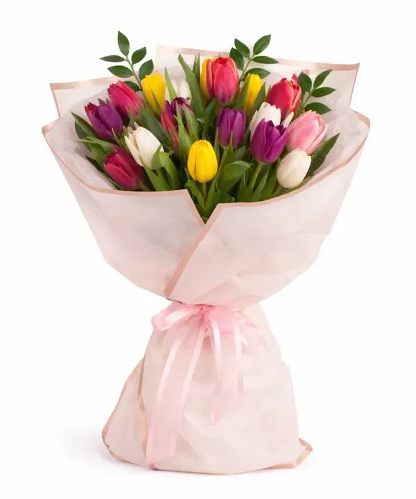 Spring Garden Tulip  wrapped Bouque  - Celebrate the beauty of the season with this vibrant Spring Garden Tulip Bouquet.We will add more blooms and select the highest quality flowers we offer in this style.
