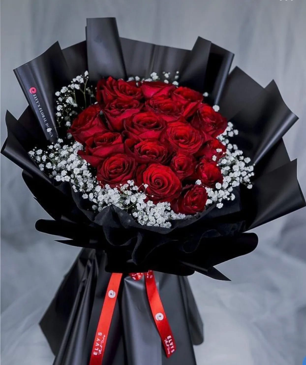 Romantic Red  - This is a Corean wrapped red rose and baby breath around 17 red roses tight rogether with nice silky ribbon 