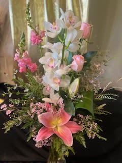 Wild Orchid - A freshly picked orchid accompanied by our wild flower collection.  Flowers subject to substitution based on supply  to emphasize the style!