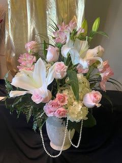 Elegance in Pearls - Soft petals with a row of pearls.