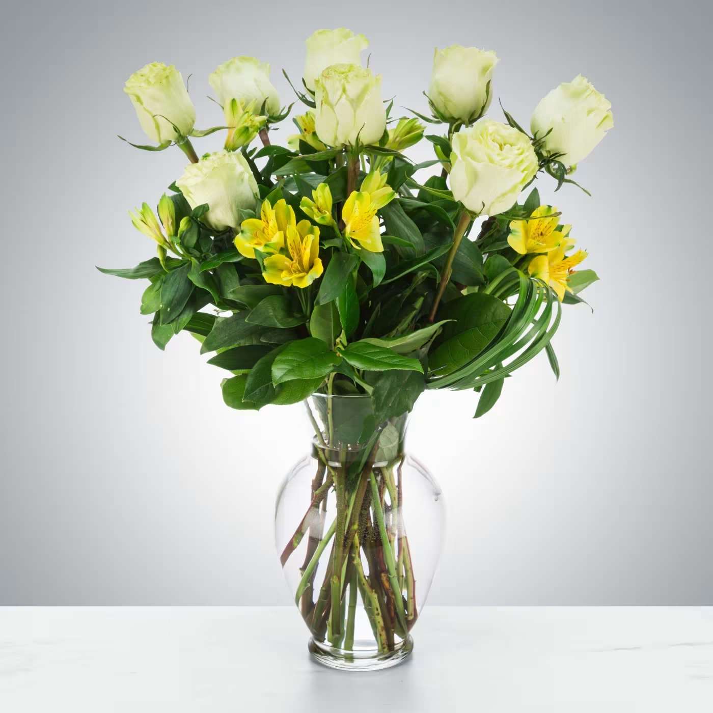 Green Apple by BloomNation™ - An all-green rose and alstroemeria is a great non-romantic flower option for somebody who likes roses. Perfect for sending as a graduation or congratulations gift to somebody you care about!  Approximate Dimensions: 15"D x 18"H