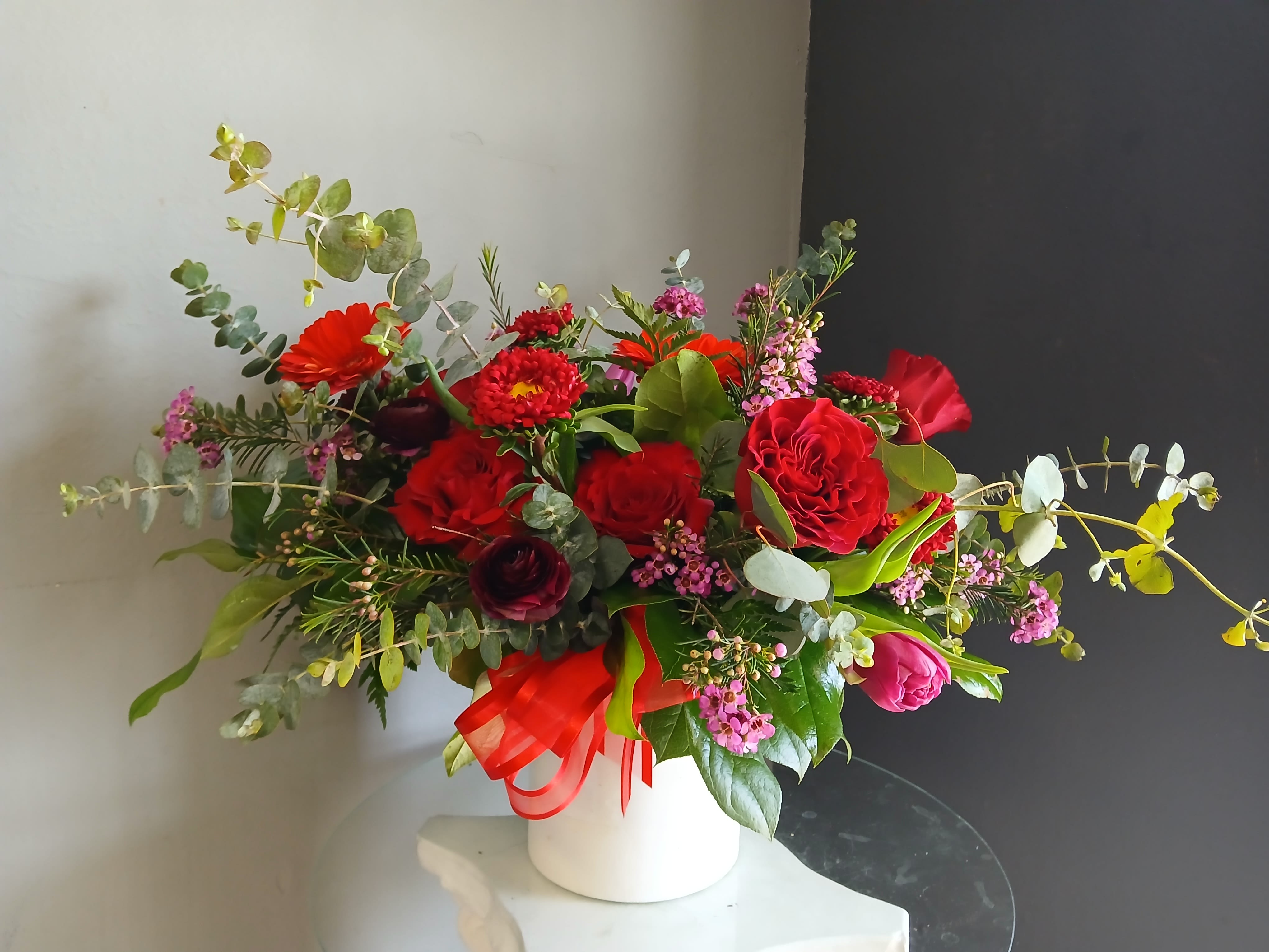 #752 Designer's Choice Vase Arrangement - This beautiful flower arrangement of fresh mixed seasonal blooms is made by local designers in the heart Orange California. Hand crafted and perfect for every occasion, from birthdays and new babies to sympathy and just because. The best choice to show you are thinking of that special someone. Can be sent as a local delivery or in-store pickup. This is an original, one of a kind arrangement. Order now before it's too late!  UPGRADES: All upgrades are applied at the designer’s discretion and fulfilled to value using the freshest seasonal and/or premium flowers available. Container upgrades may be included when possible; otherwise, value is reflected in the floral selection while maintaining the original design style.  