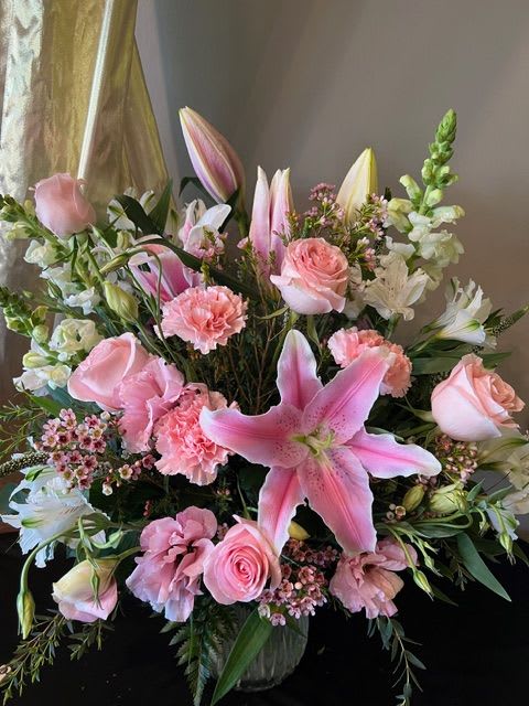 Passionate - A spread of warm toned flowers for a smitten feel. Flowers subject to substitution!