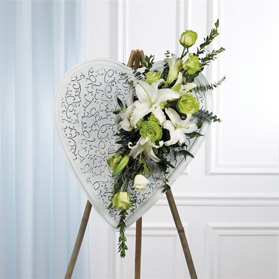 Heartfelt Celebration of Life - By Katherine's Flowers - Roses, lilies, eucalyptus and Italian ruscus are expertly blended with a white heart easel to express heartfelt condolences for a person that was loved, admired and will be greatly missed.