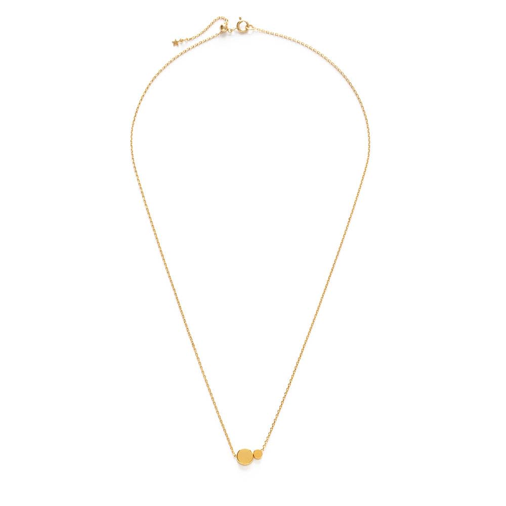 Dot Dot Necklace - A timeless fun necklace that can be worn alone or great for layering.The 7mm and 4mm beads are strung on a 20" adjustable fine cable. Made of brass with a 14k gold plate + coated to resist tarnish. Designed/handcrafted in the USA. Arrives in a gift box.