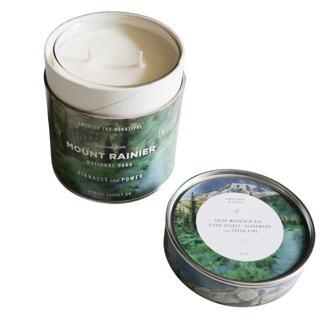 Mount Rainier Large Candle - Escape to the majestic peaks of Mt. Rainier with our signature artisan PNW National Park candle. Infused with invigorating notes of crisp mountain air, Sitka spruce, fresh pine, and comforting cedarwood. 11oz of PNW goodness. Burn time 50+ hours. The candle arrives gift wrapped in tissue paper, gift bag and topped with ribbon.