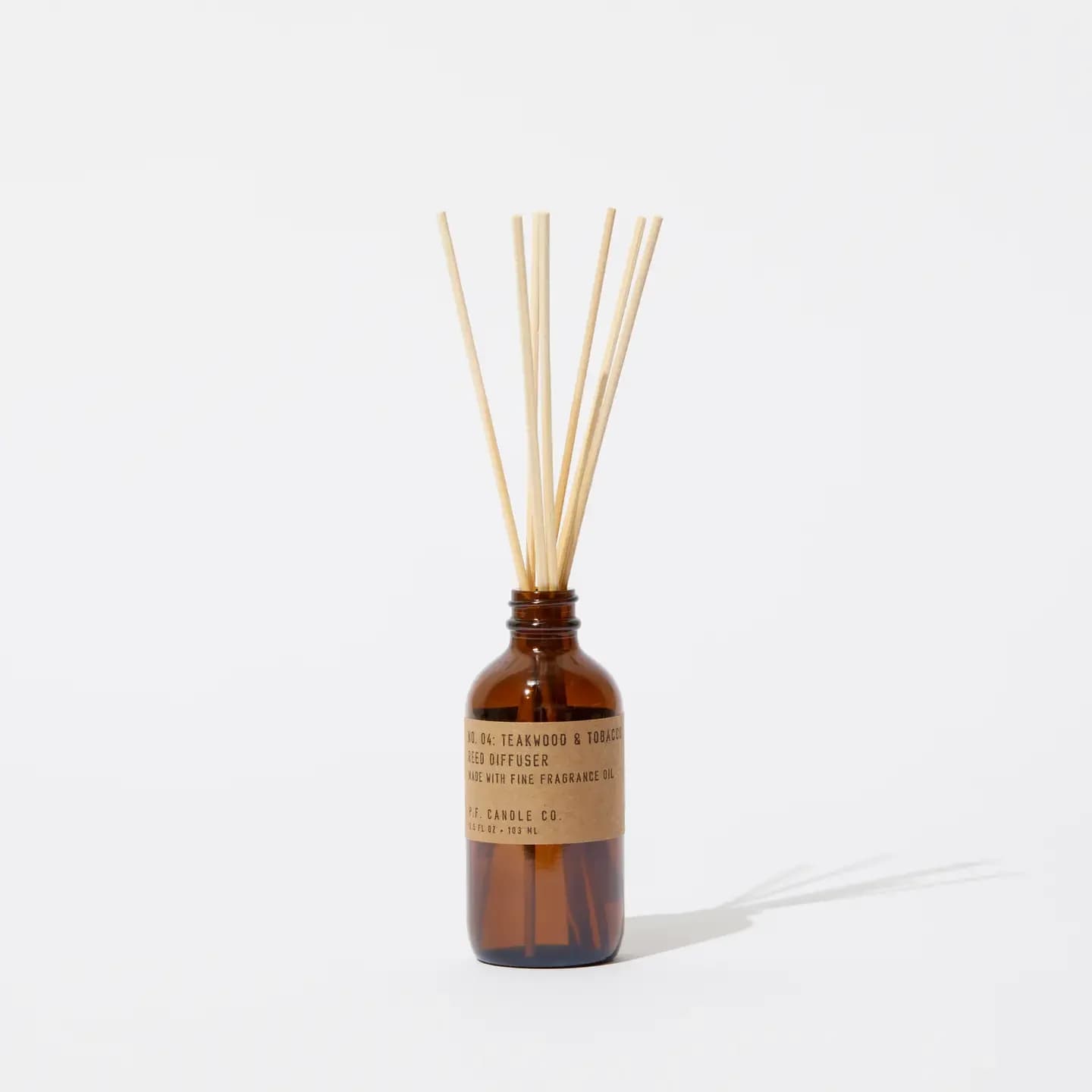 Teakwood &amp; Tobacco Reed Diffuser - Bold and complex, this scent starts out musky and a little bit sexy with lead notes of leather, pepper, and tobacco. A base of teak and sandalwood with a hint of orange and patchouli make this best selling fragrance popular with men and women.  Top Notes: orange leather, tobacco, amber, musk  Heart: black tea, black pepper  Base: sandalwood, teak, cedarwood, patchouli 