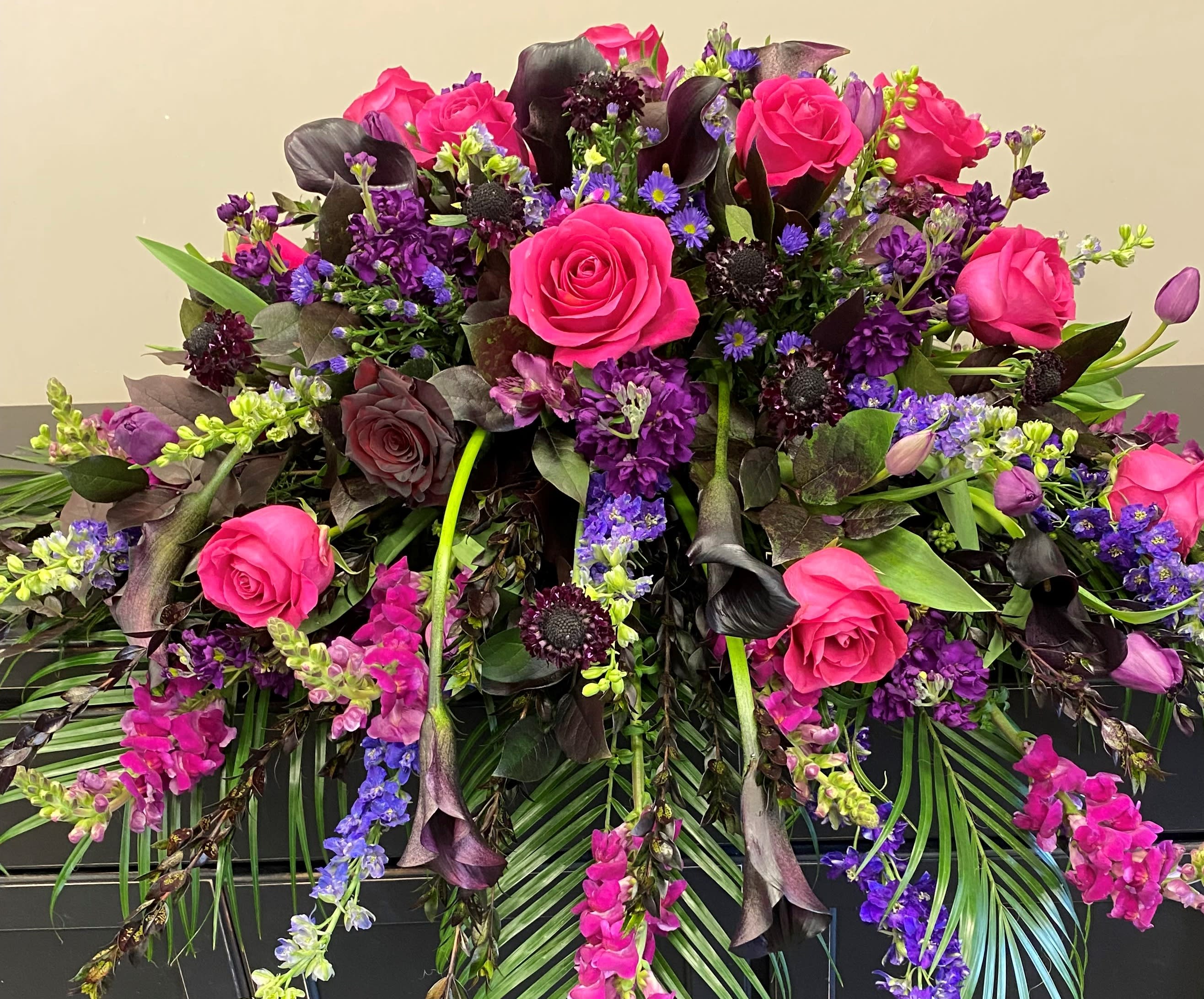 Plum Love - A stunning casket piece created in warm plumb colors. Spectacular