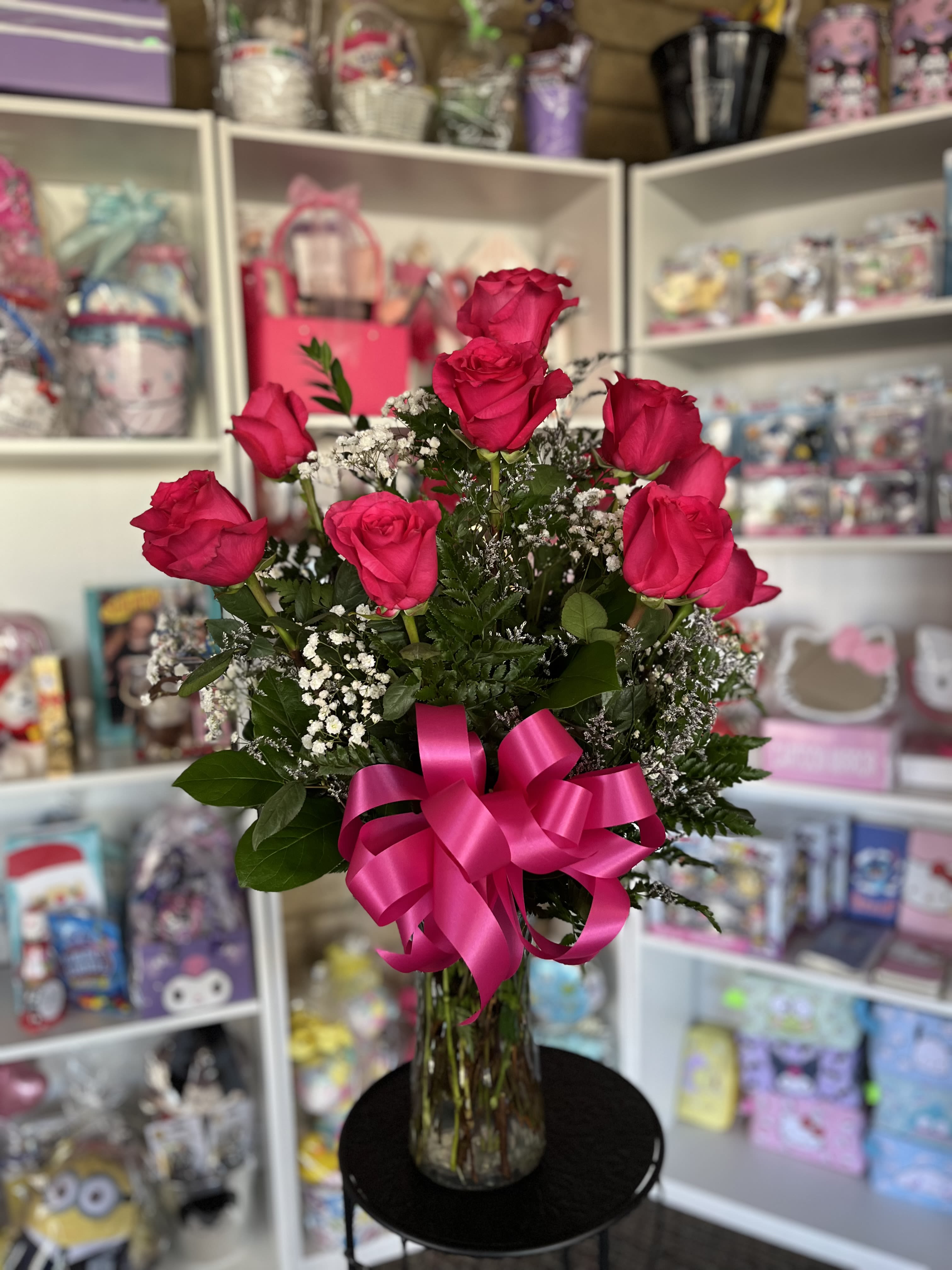 Fuchsia PINK Dozen  - fresh Fuchsia  pink flowers in  glass vase 