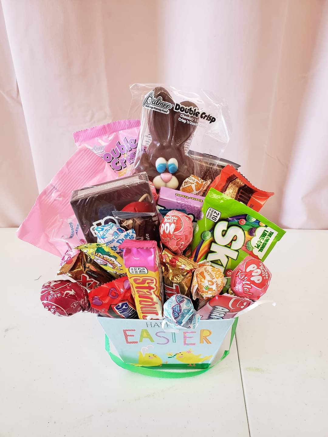 Small Easter Basket - Small Easter basket filled with  assorted delicious candy and treats! Can be customized. Comes shrink wrapped with a bow. Great add on to a floral arrangement!