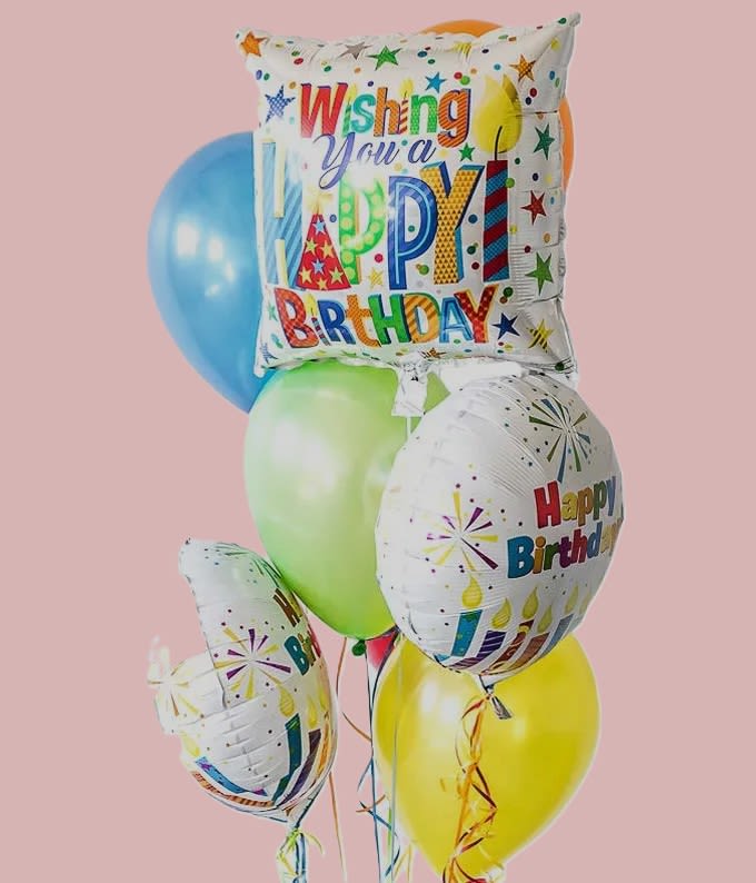 Balloon Bouquet (Birthday) - A bright cluster of mixed-color foil balloons that reads "Happy Birthday" in bold, festive graphics-perfect as a birthday bouquet or party centerpiece. This balloon bouquet (birthday) pops in blues, purples, yellows and rainbow tones with round and star shapes arranged tightly for a full, celebratory look that works for kids, teens, parents, and milestone parties alike.  Each cluster includes assorted Happy Birthday mylar/foil balloons featuring confetti dots, candles, stars and gradient designs, finished with long multicolored curling ribbons for a playful, party-ready cascade. The compact, full grouping makes a cheerful standalone gift or a lively accent to ground-level floral arrangements and gift tables.  Choose this balloon bouquet to make the person you're celebrating feel seen and celebrated the moment it arrives-bright, easy, and ready to delight. Balloons arrive pre-arranged and ready to display; avoid prolonged outdoor exposure and keep away from sharp objects to preserve the finish.