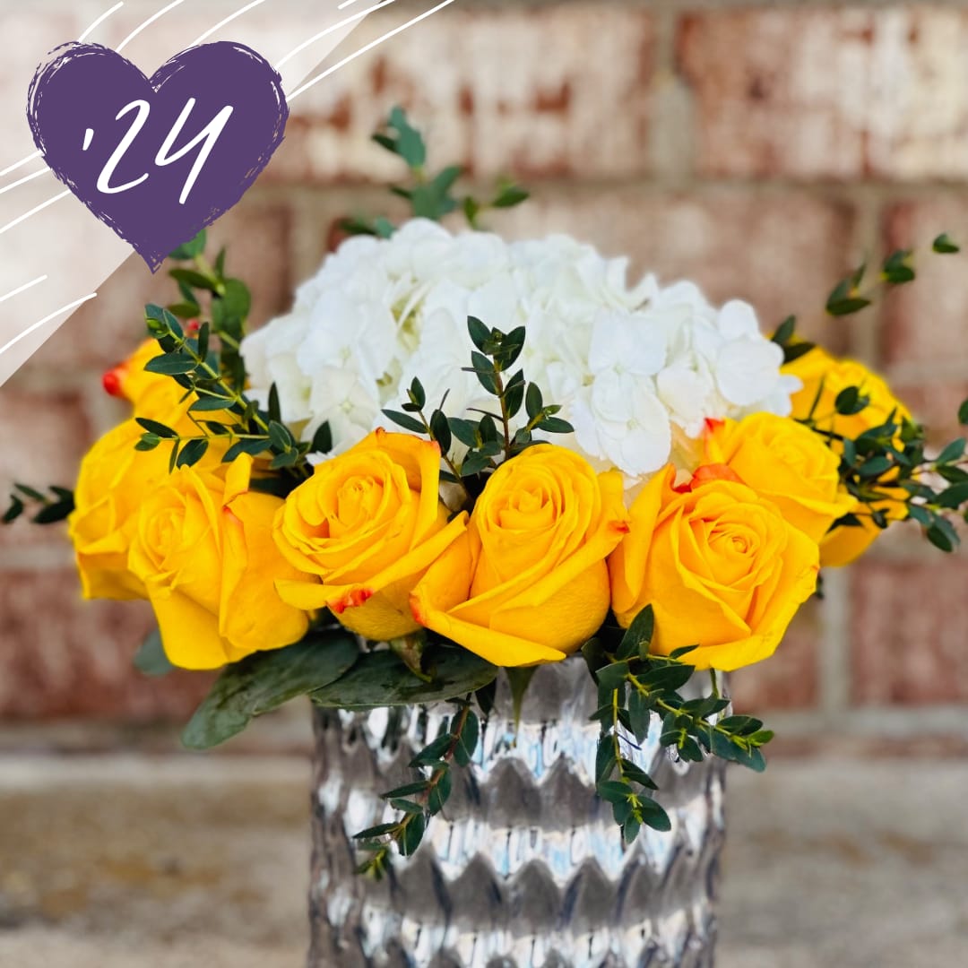 How Do You Like Me Now?: Yellow  - Twelve gorgeous roses encircle a white hydrangea, all presented in a patterned metallic vase of silver, pink, bronze or gold! It's gorg!!!!