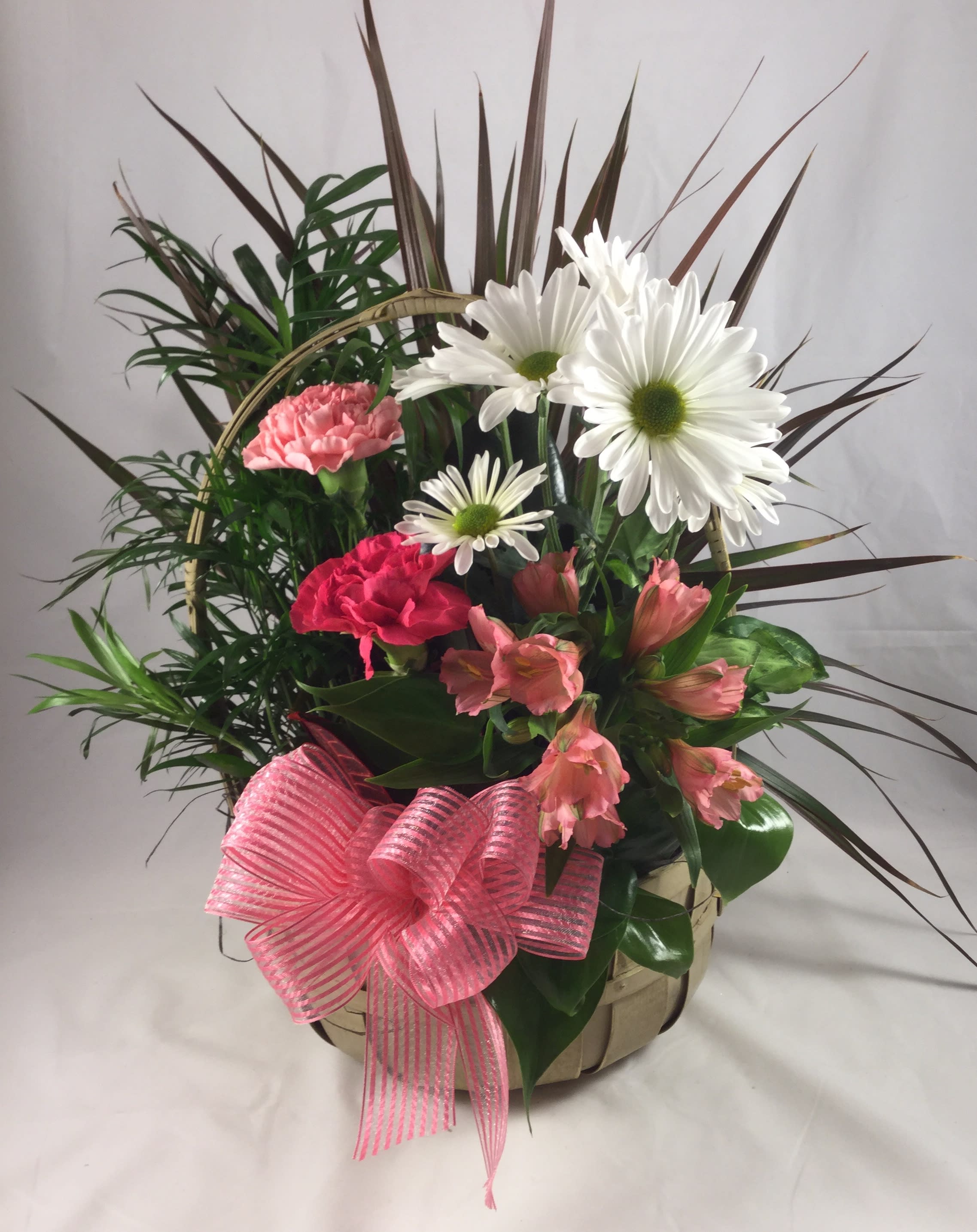 Garden's Delight Dish Garden - A beautiful mix of a variety of green plants in a basket. Accented with fresh flowers and a bow. 