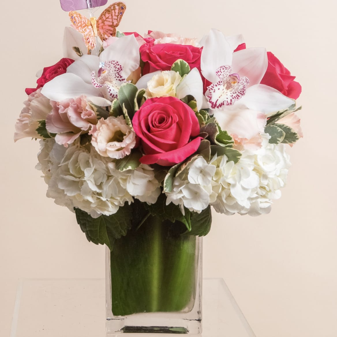 Darla - Pink Orchids, Roses and hydrangeas - This cute pink bundle is perfect for so many occasions! Roses, cymbidium Orchids, lishiantus and hydrangeas. So far the number 1 selling product by Andes Florist.
