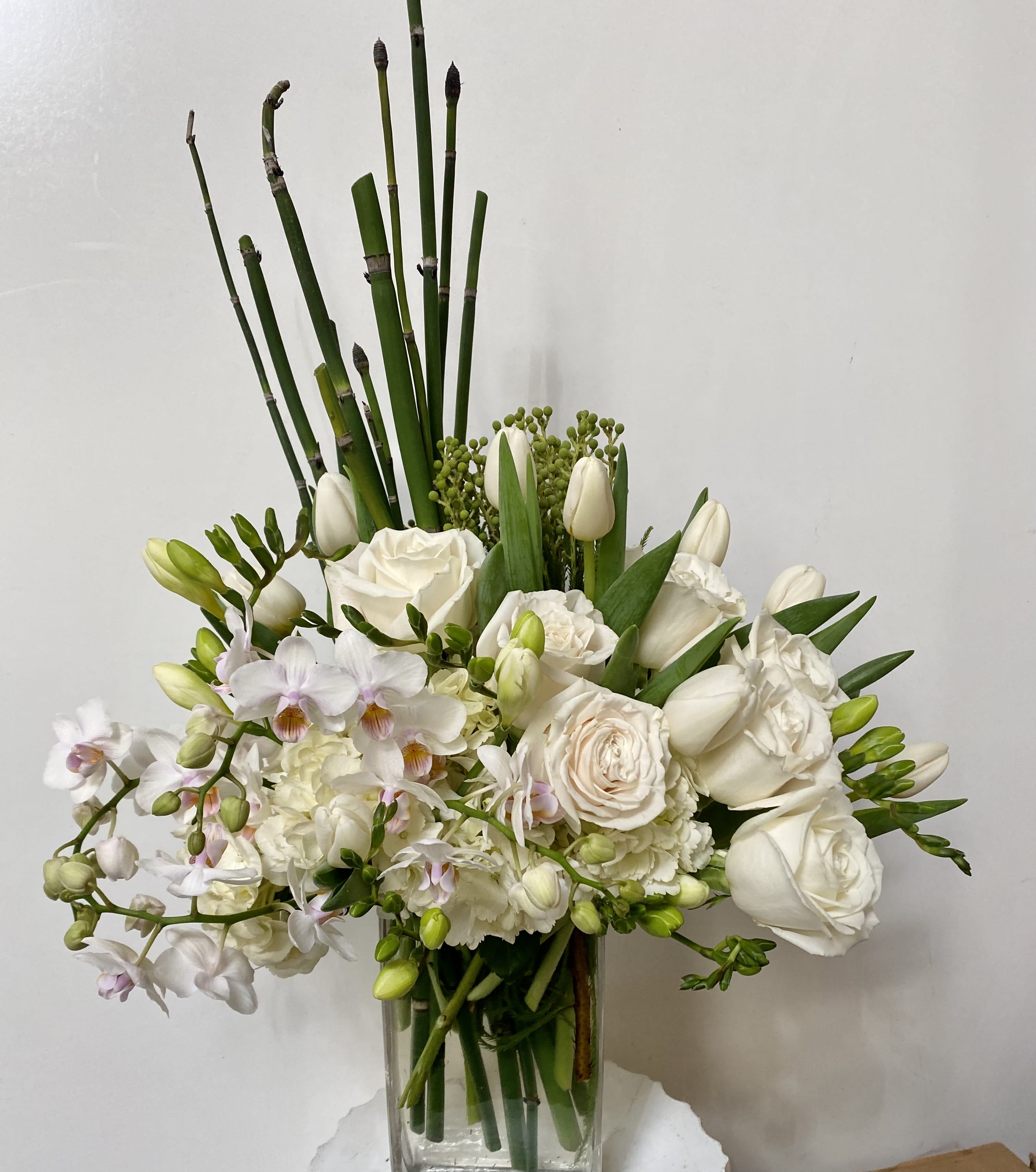 Gone With The Wind - Beautiful, elegant arrangement of white flowers. Roses, Hydrangeas, orchids 