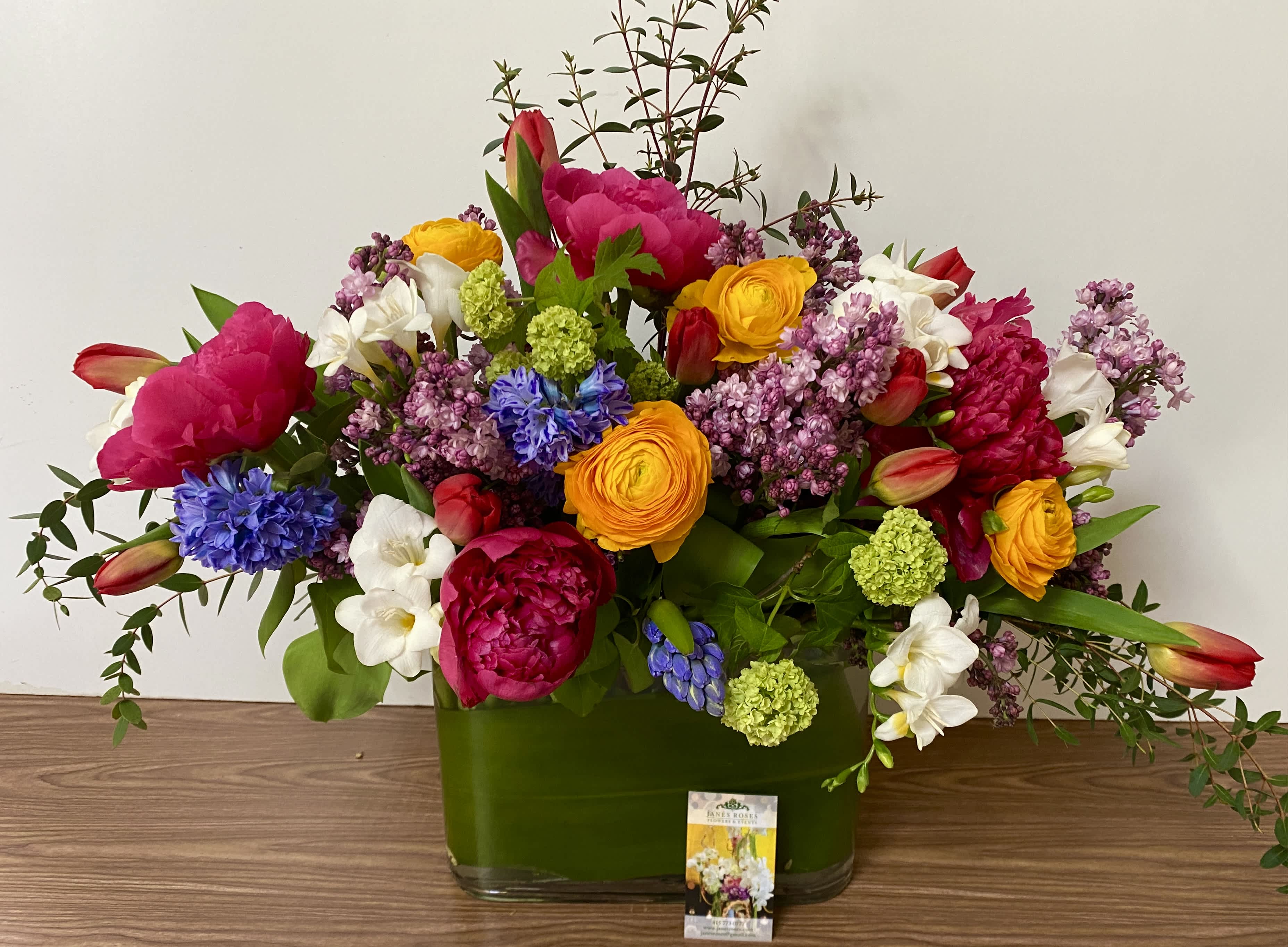 Manhattan - pink ceramic vase with a 4 pink peony and purple leseantus, arranged and will be delivered by Jane's Roses of San Francisco