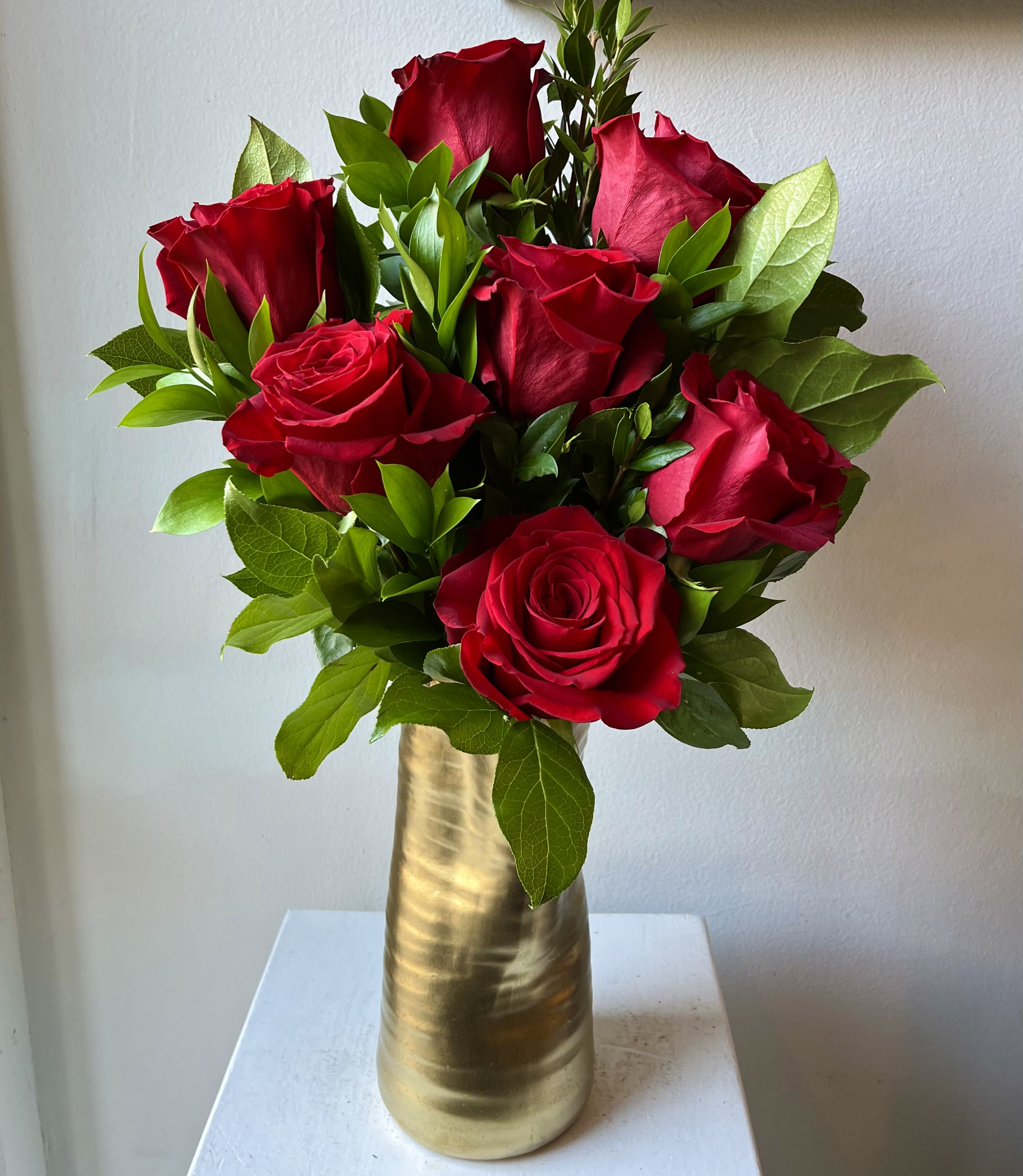 King Crimson in MODERN GOLD  VASE - For the Stylish Love in your life... 7, 9 or 12 Red Rose Options and Greenery in a Designer Modern Gold or White Vase.  