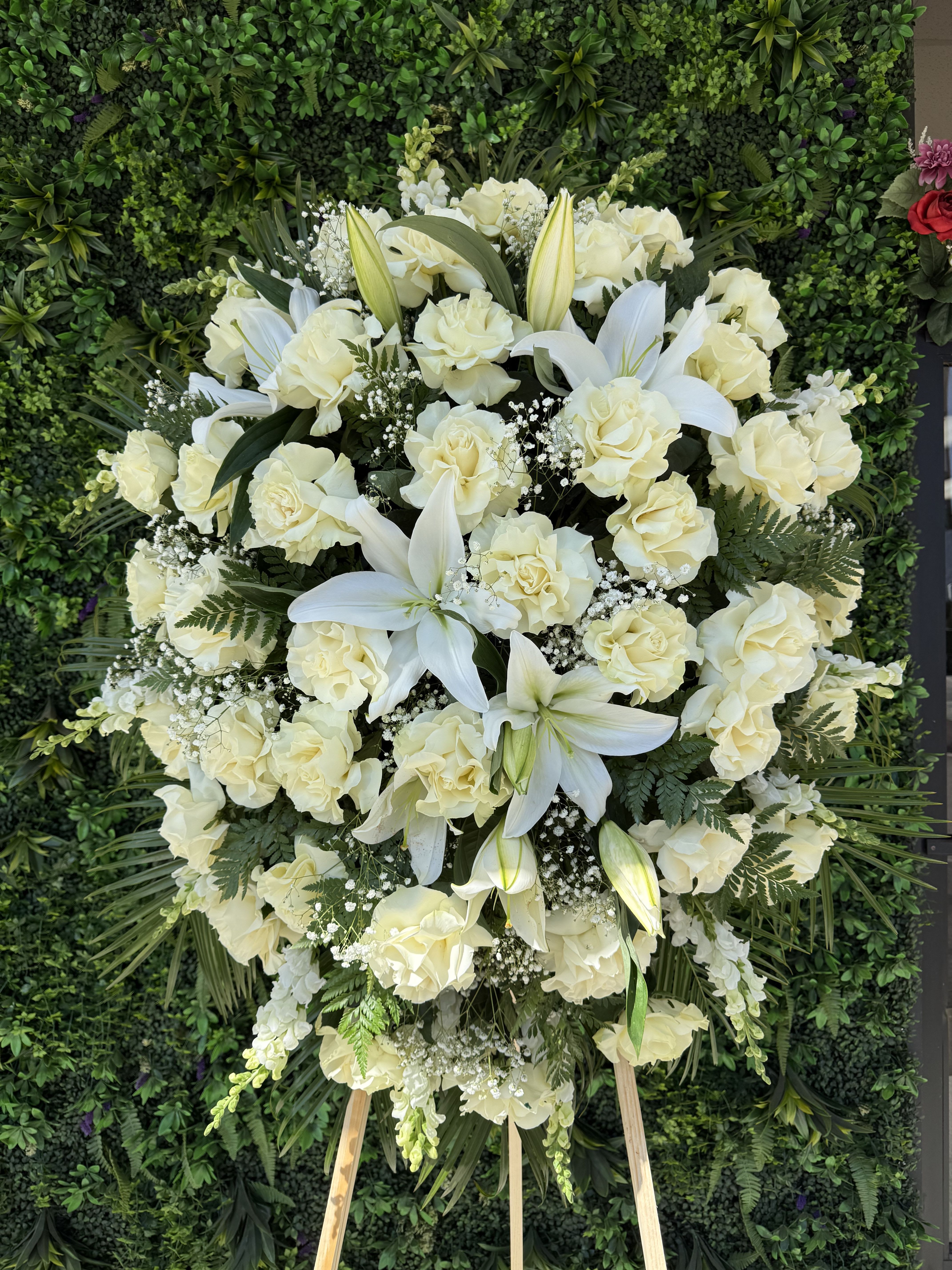 Spray - A graceful arrangement of pure white flowers, symbolizing peace, remembrance, and eternal love. Thoughtfully designed to express sympathy and respect, these delicate blooms offer comfort and a quiet sense of serenity during moments of loss.