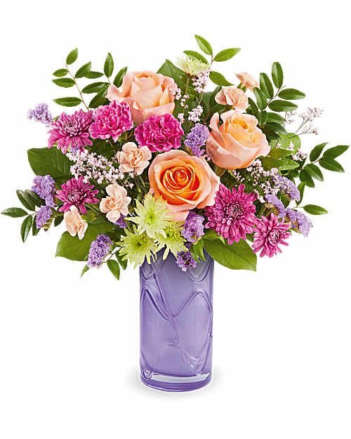 Teleflora's Pretty Daydream Bouquet - Celebrate her sweetest moments with Teleflora's Pretty Daydream Bouquet, a dreamy mix of soft, vibrant blooms beautifully arranged in Teleflora's Pretty Daydream Vase-a charming keepsake she'll enjoy long after Mother's Day.