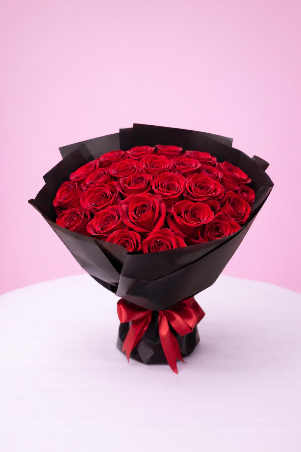 25 ROSES BOUQUET - 25 Roses wrapped in black paper. 