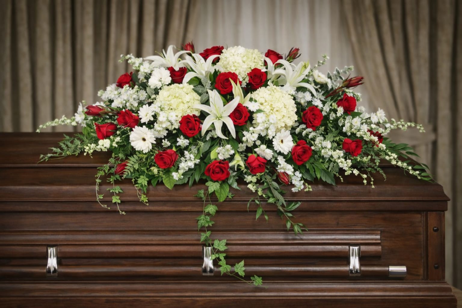 Forever Peaceful Casket Spray  - The Forever Peaceful Casket Spray from FloralFabulous is a timeless and serene tribute designed to honor a loved one with peace, purity, and heartfelt remembrance. This elegant arrangement features pristine white roses, graceful lilies, and delicate accent blooms, all beautifully arranged with lush greenery for a soft, flowing presentation.  The all-white color palette symbolizes peace, eternal love, and remembrance, making this arrangement a meaningful and traditional choice for funeral and memorial services. Designed to rest gracefully atop the casket, this spray creates a calming and elegant focal point, offering comfort and support to family and friends.  The Forever Peaceful Casket Spray is ideal for families seeking a classic and refined expression of sympathy, providing a gentle and respectful tribute that reflects a life of love and cherished memories.  FloralFabulous proudly provides funeral flower delivery and casket sprays in Round Rock, TX and the greater Austin area, helping families express heartfelt condolences with care, dignity, and compassion.