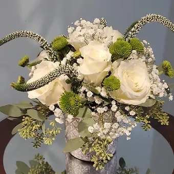 Designer white arrangement  - Petit designer arrangement,  premium white rose, silver dollar euc, veronica, astrantia and babysbreath in a posh container.  Made for smaller spaces.