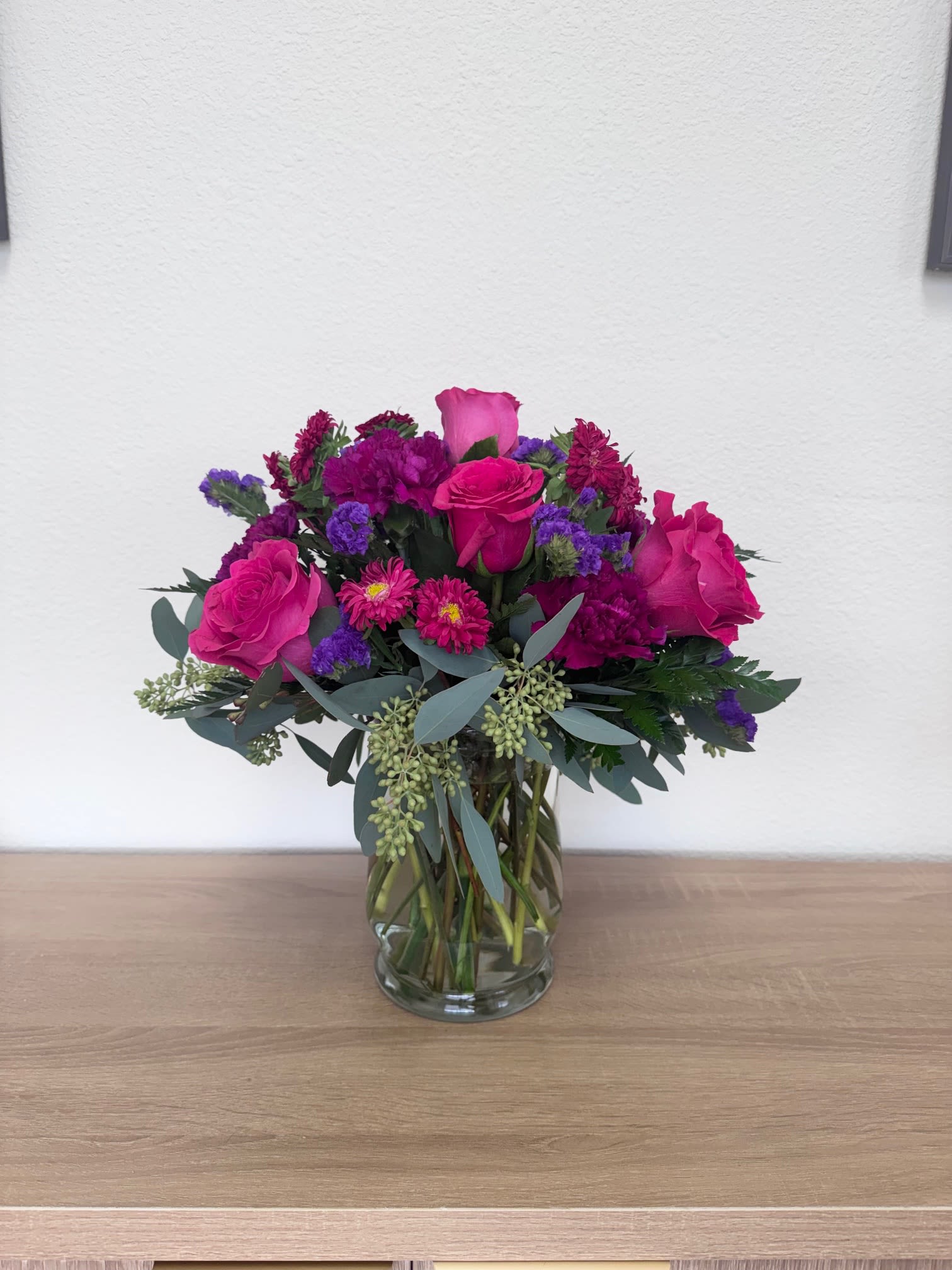 Berry Blush - This vibrant floral arrangement features bold pinks and purples perfect for Birthdays, thank-you, romance or simply brightening someone's day.