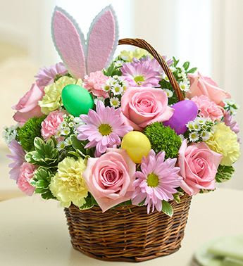 Easter Spring basket - The flowers and colors of spring with a pop of festive Easter to finish the basket