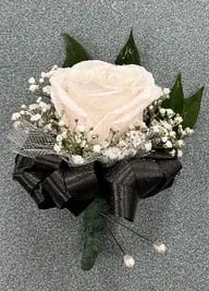 Men's Deluxe Boutonniere - White rose, babies breath, tulle, and bow. The roses and bow can come in a variety of colors, include color choice in the notes if ordering online. it also can come in fresh or silk flowers.