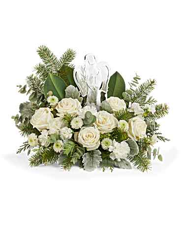 Teleflora's Light Of Love Bouquet - Teleflora's Light of Love Bouquet offers a serene expression of the season. Elegant white roses and greens surround Teleflora's keepsake Crystal Angel-perfect for Christmas, sympathy, or spiritual holiday décor. Teleflora's Light of Love Bouquet includes white roses, white carnations, white miniature carnations, and white button spray chrysanthemums.  Orientation: All-Around