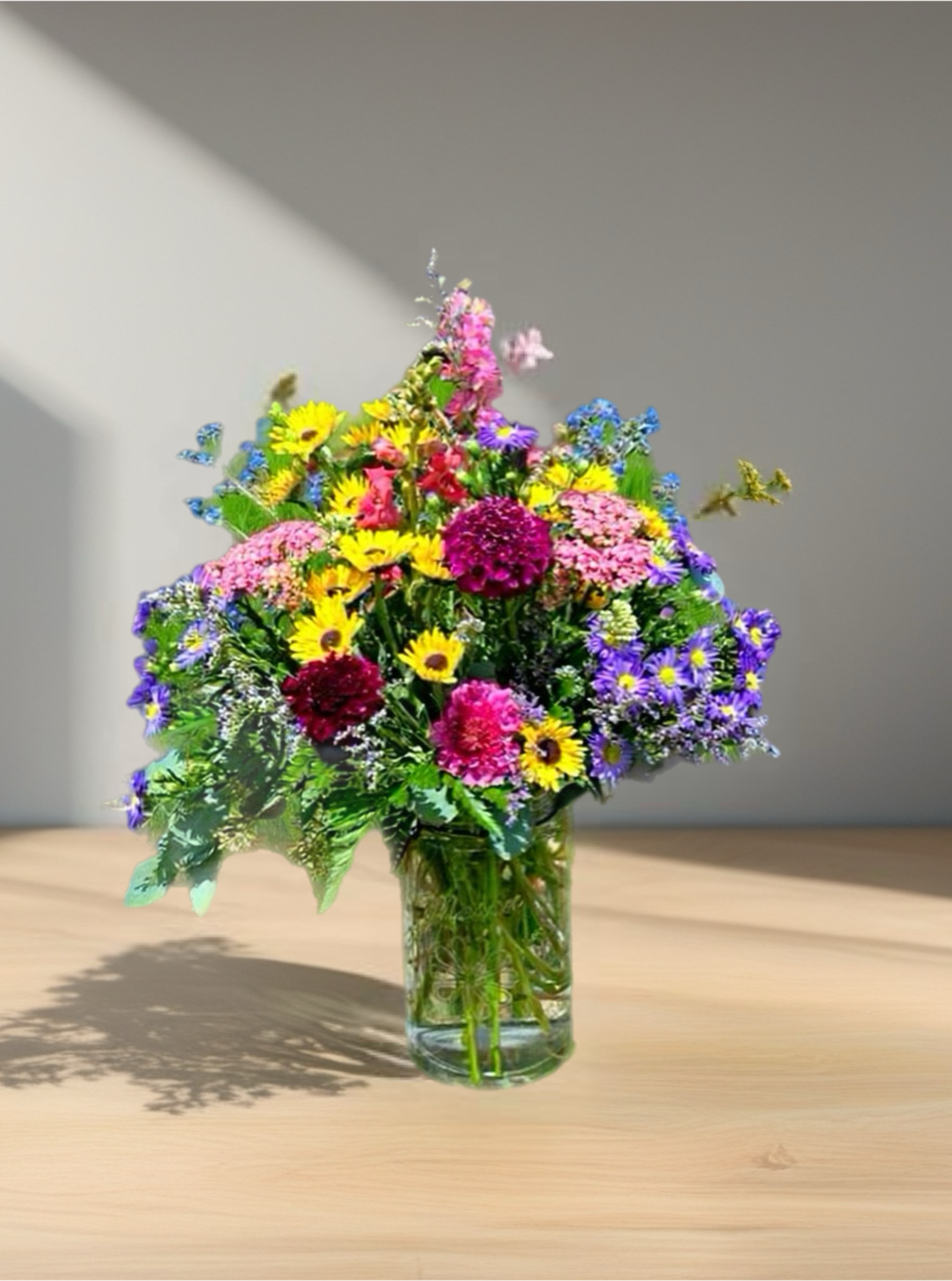 Fields of Wildflowers - All the wildflowers came to play to make this arrangement pop in any space.  This large and colorful beauty will brighten anyone's day.