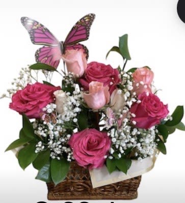 Basket Arrangement -  Arrangement will be made in a Basket  with wet floral foam the colors will be from the pink and purple hues