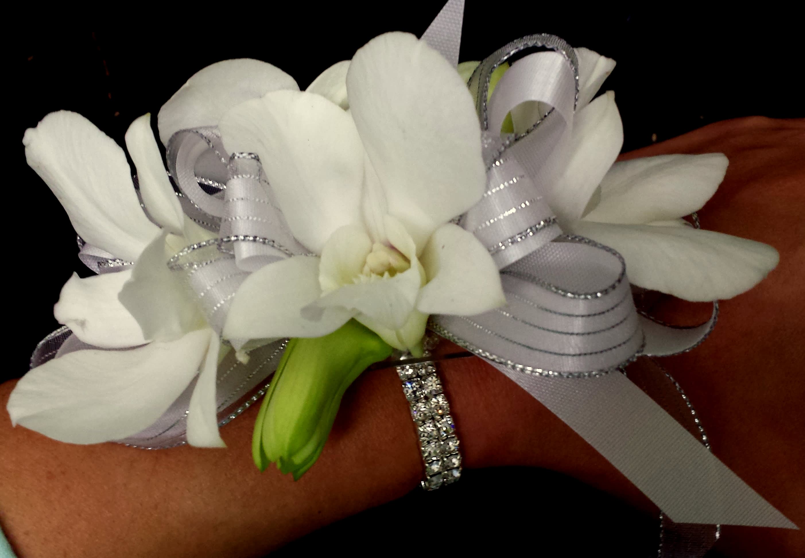 Dendrobium orchid crosage - Beautiful classic Corsage featuring the several white dendrobium orchid for and the ribbon commit of your choice