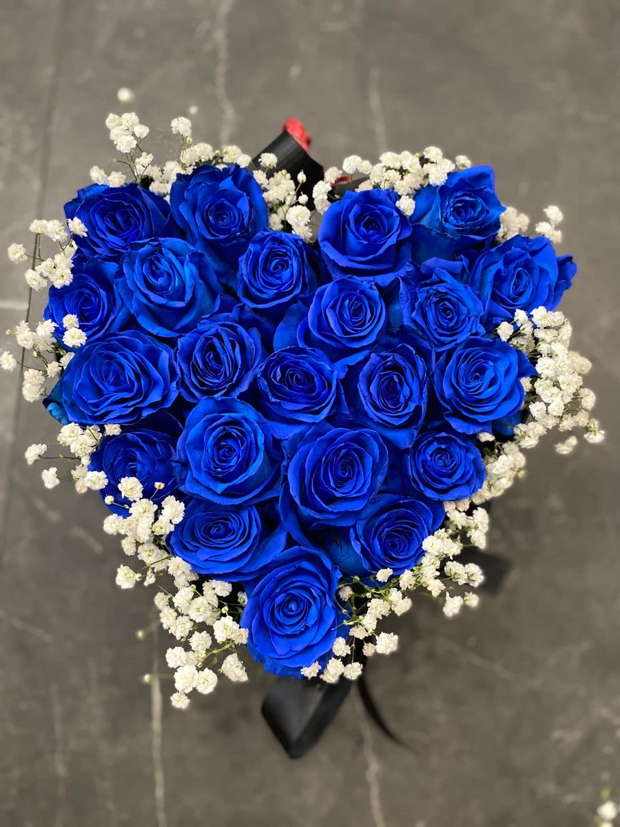  For Him: Midnight Blue Rose Heart - Bold and unforgettable, this heart-shaped arrangement features striking blue roses accented with delicate white blooms. A powerful and modern way to express love, loyalty, and admiration—perfect for making a strong Valentine’s statement.